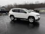 2016 White /Black Jeep Compass Sport 4WD (1C4NJDBB0GD) with an 2.4L I4 DOHC 16V engine, 6 Speed Auto transmission, located at 11115 Chardon Rd. , Chardon, OH, 44024, (440) 214-9705, 41.580246, -81.241943 - This 2016 Jeep Compass Sport 4WD is a compact SUV designed for versatility and efficiency, featuring a 2.4L I4 engine coupled with a 6-speed automatic transmission. It offers practical features such as an auto-dimming rearview mirror for reduced glare, dusk-sensing headlights for enhanced visibility - Photo#3