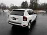 2016 White /Black Jeep Compass Sport 4WD (1C4NJDBB0GD) with an 2.4L I4 DOHC 16V engine, 6 Speed Auto transmission, located at 11115 Chardon Rd. , Chardon, OH, 44024, (440) 214-9705, 41.580246, -81.241943 - This 2016 Jeep Compass Sport 4WD is a compact SUV designed for versatility and efficiency, featuring a 2.4L I4 engine coupled with a 6-speed automatic transmission. It offers practical features such as an auto-dimming rearview mirror for reduced glare, dusk-sensing headlights for enhanced visibility - Photo#7