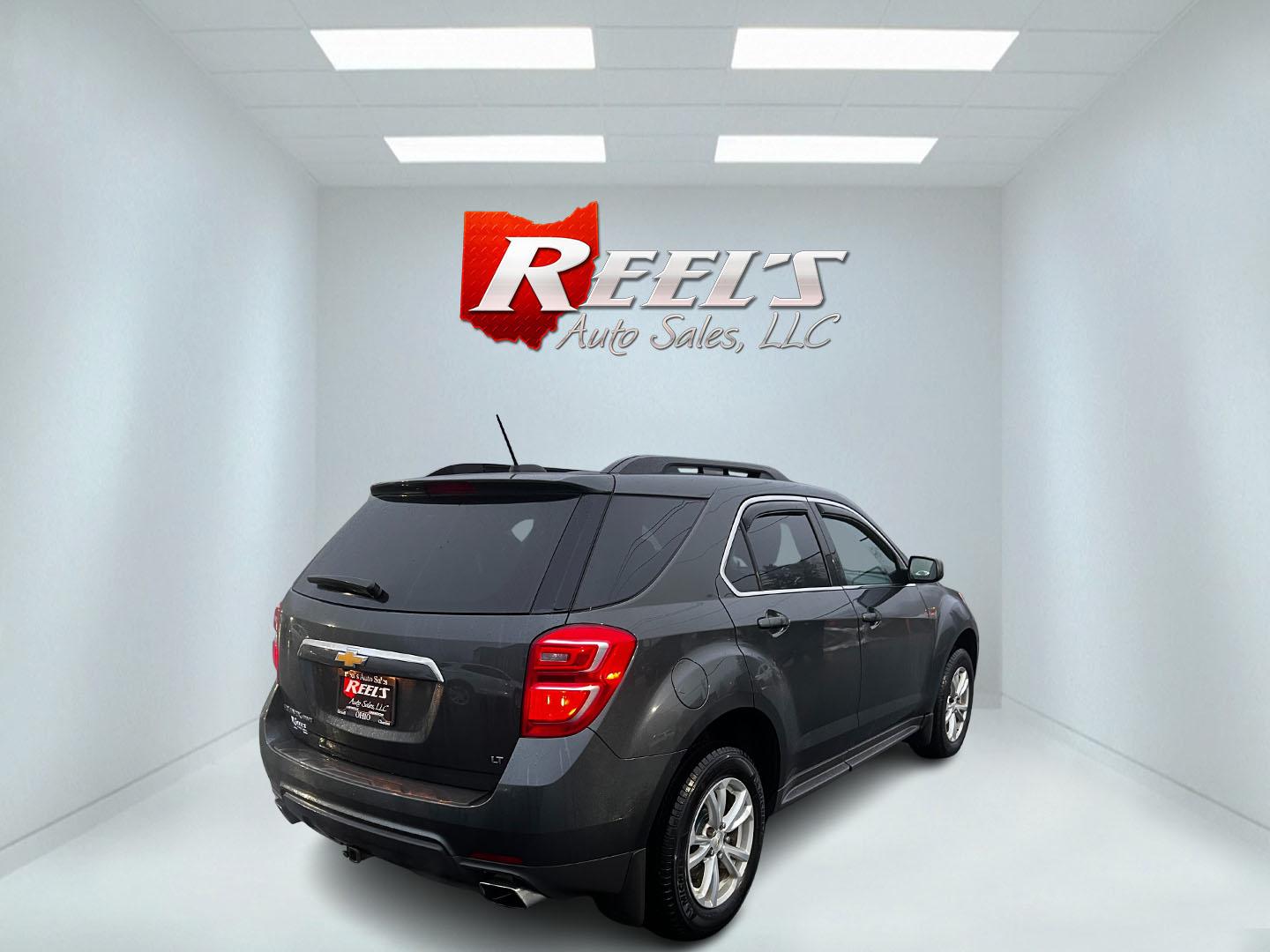 2017 Gray /Black Chevrolet Equinox LT AWD (2GNFLFE30H6) with an 3.6L V6 DOHC 24V engine, 6A transmission, located at 547 E. Main St., Orwell, OH, 44076, (440) 437-5893, 41.535435, -80.847855 - This One Owner 2017 Chevrolet Equinox LT AWD is a mid-sized SUV that strikes a balance between power and comfort, featuring a potent 3.6L V6 engine producing 301 horsepower paired with a 6-speed automatic transmission. It offers a respectable towing capacity of 3,500 pounds, making it suitable for t - Photo#5