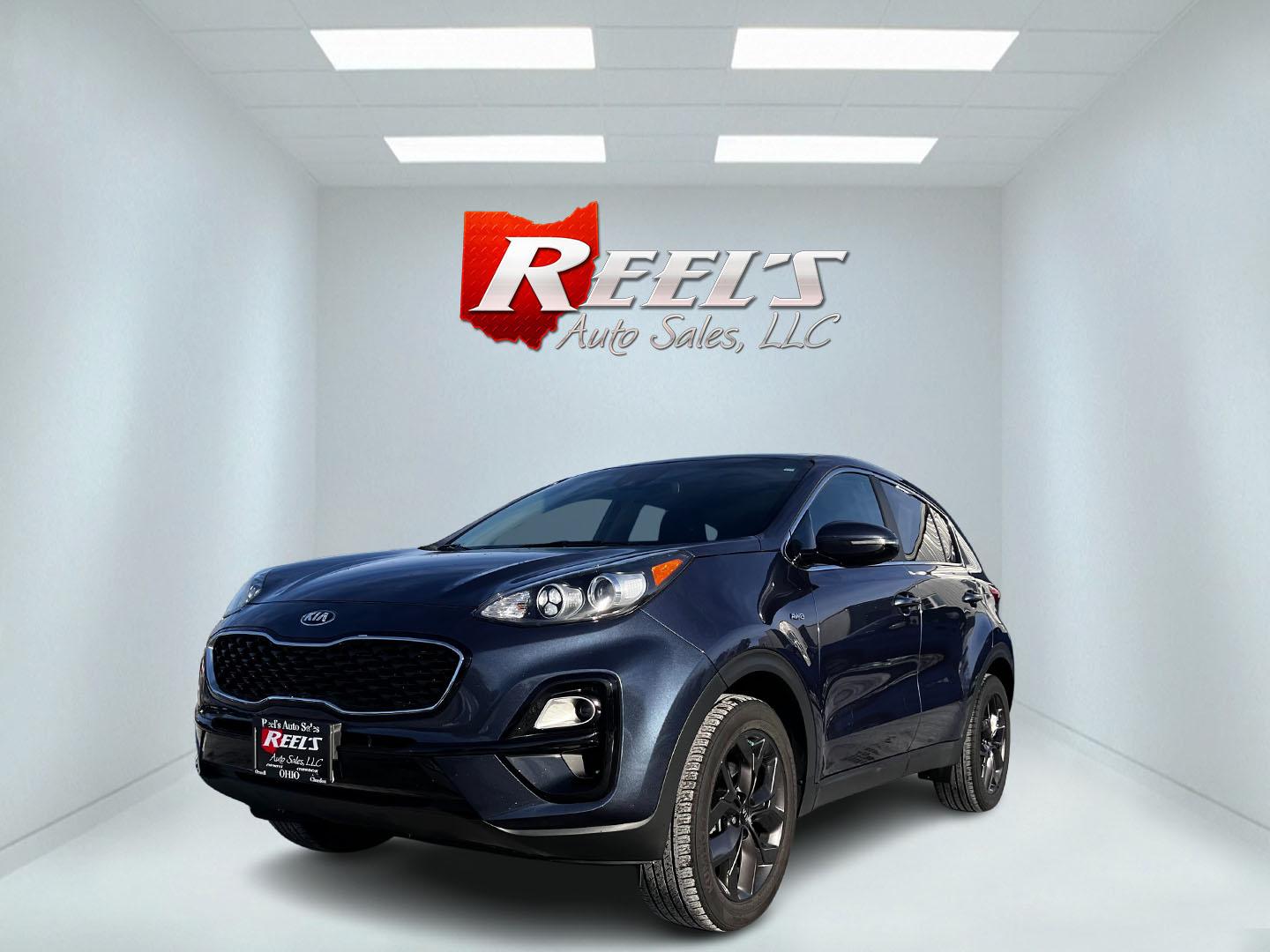 2022 Blue /Black Kia Sportage LX AWD (KNDPMCAC6N7) with an 2.4L I4 DOHC 24V engine, 6A transmission, located at 11115 Chardon Rd. , Chardon, OH, 44024, (440) 214-9705, 41.580246, -81.241943 - This One Owner 2022 Kia Sportage LX AWD is a compact SUV designed to deliver both comfort and modern technology features. Powered by a 2.4L I4 GDI engine with a 6-speed automatic transmission, it achieves around 26 MPG on the highway, offering efficiency for day-to-day driving. Inside, this Sportage - Photo#0