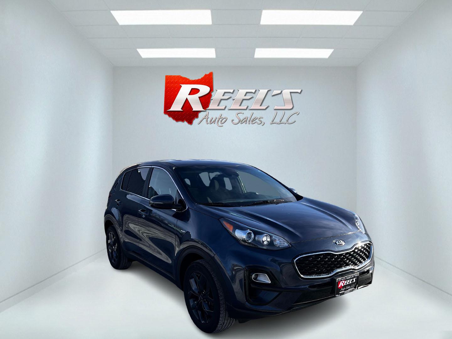 2022 Blue /Black Kia Sportage LX AWD (KNDPMCAC6N7) with an 2.4L I4 DOHC 24V engine, 6A transmission, located at 11115 Chardon Rd. , Chardon, OH, 44024, (440) 214-9705, 41.580246, -81.241943 - This One Owner 2022 Kia Sportage LX AWD is a compact SUV designed to deliver both comfort and modern technology features. Powered by a 2.4L I4 GDI engine with a 6-speed automatic transmission, it achieves around 26 MPG on the highway, offering efficiency for day-to-day driving. Inside, this Sportage - Photo#2