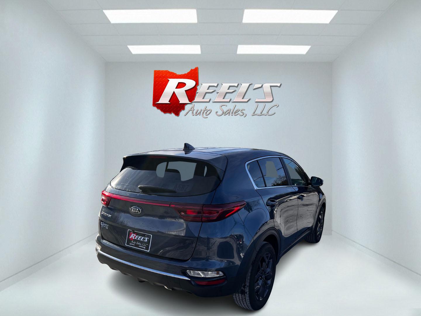 2022 Blue /Black Kia Sportage LX AWD (KNDPMCAC6N7) with an 2.4L I4 DOHC 24V engine, 6A transmission, located at 11115 Chardon Rd. , Chardon, OH, 44024, (440) 214-9705, 41.580246, -81.241943 - This One Owner 2022 Kia Sportage LX AWD is a compact SUV designed to deliver both comfort and modern technology features. Powered by a 2.4L I4 GDI engine with a 6-speed automatic transmission, it achieves around 26 MPG on the highway, offering efficiency for day-to-day driving. Inside, this Sportage - Photo#5