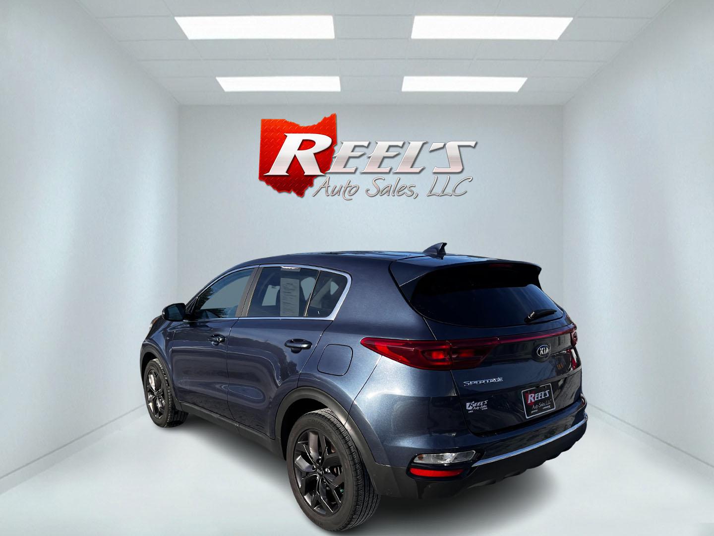 2022 Blue /Black Kia Sportage LX AWD (KNDPMCAC6N7) with an 2.4L I4 DOHC 24V engine, 6A transmission, located at 11115 Chardon Rd. , Chardon, OH, 44024, (440) 214-9705, 41.580246, -81.241943 - This One Owner 2022 Kia Sportage LX AWD is a compact SUV designed to deliver both comfort and modern technology features. Powered by a 2.4L I4 GDI engine with a 6-speed automatic transmission, it achieves around 26 MPG on the highway, offering efficiency for day-to-day driving. Inside, this Sportage - Photo#7