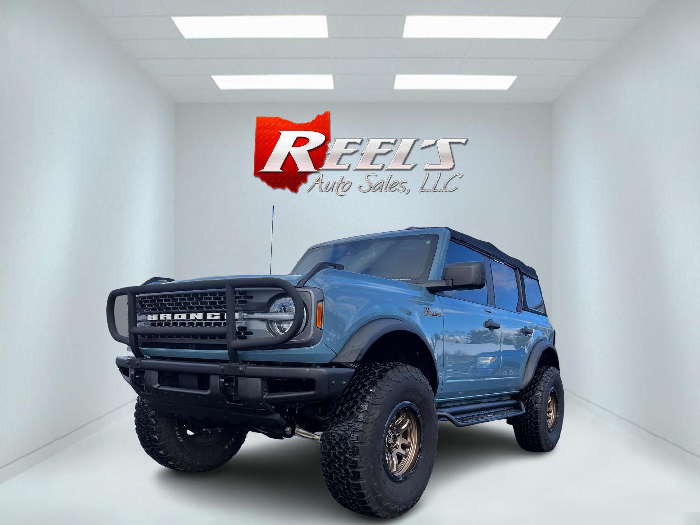 2022 Blue /Black Ford Bronco Badlands 4-Door (1FMEE5DP6NL) with an 2.7L V6 DOHC 24V TWIN TURBO engine, 10 Speed Auto transmission, located at 11115 Chardon Rd. , Chardon, OH, 44024, (440) 214-9705, 41.580246, -81.241943 - This 2022 Ford Bronco Badlands, equipped with a robust 2.7L Twin Turbo EcoBoost V6 engine, delivers an impressive 330 horsepower and 415 lb-ft of torque, making it a formidable choice for off-road enthusiasts. Its 10-speed automatic transmission ensures smooth and responsive performance, while 37" a - Photo#0