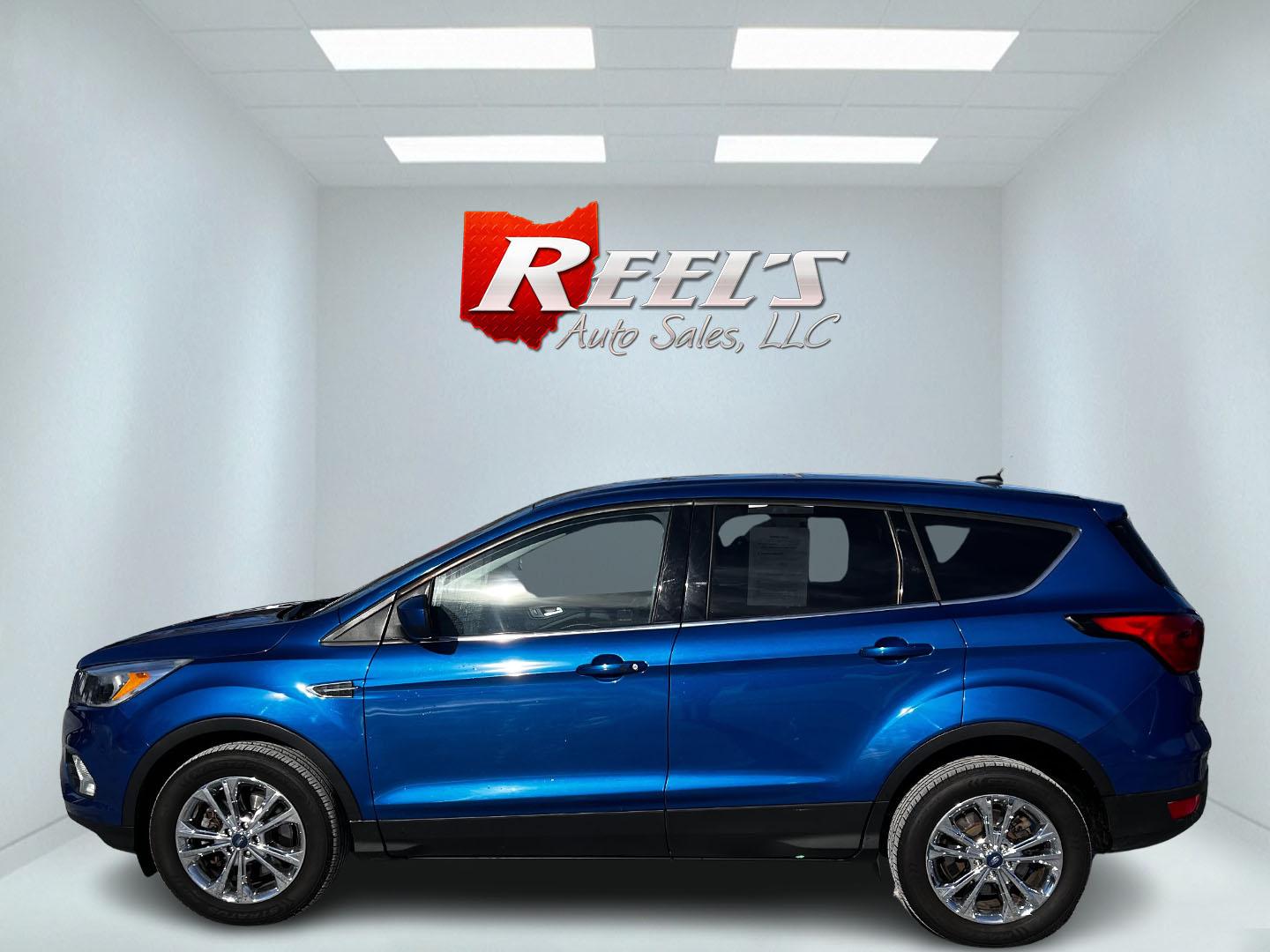 2019 Blue /Black Ford Escape SE 4WD (1FMCU9GD2KU) with an 1.5L I4 DOHC 16V TURBO engine, 6A transmission, located at 11115 Chardon Rd. , Chardon, OH, 44024, (440) 214-9705, 41.580246, -81.241943 - This One Owner 2019 Ford Escape SE 4WD is a well-equipped compact SUV that combines efficiency, comfort, and modern technology. It features a 1.5-liter turbocharged I4 EcoBoost engine paired with a 6-speed automatic transmission, delivering robust performance while achieving 28 MPG on the highway. C - Photo#9