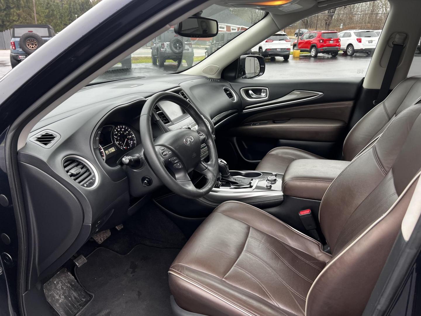 2018 Blue /Brown Infiniti QX60 Base AWD (5N1DL0MM7JC) with an 3.5L V6 DOHC 24V engine, CVT transmission, located at 11115 Chardon Rd. , Chardon, OH, 44024, (440) 214-9705, 41.580246, -81.241943 - This 2018 Infiniti QX60 AWD is a luxurious midsize SUV that comes well-equipped with features designed for comfort and convenience. It includes a sophisticated leather interior and heated front seats, enhancing its premium feel. Front and rear parking sensors provide increased safety and ease when m - Photo#16