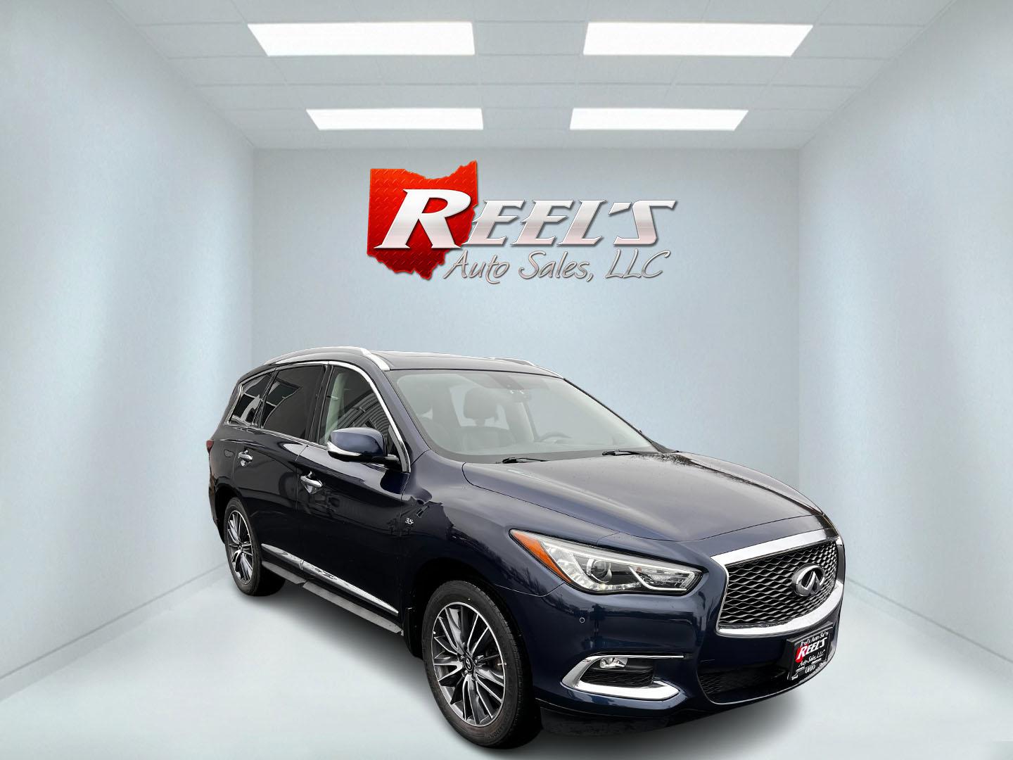 2018 Blue /Brown Infiniti QX60 Base AWD (5N1DL0MM7JC) with an 3.5L V6 DOHC 24V engine, CVT transmission, located at 11115 Chardon Rd. , Chardon, OH, 44024, (440) 214-9705, 41.580246, -81.241943 - This 2018 Infiniti QX60 AWD is a luxurious midsize SUV that comes well-equipped with features designed for comfort and convenience. It includes a sophisticated leather interior and heated front seats, enhancing its premium feel. Front and rear parking sensors provide increased safety and ease when m - Photo#2