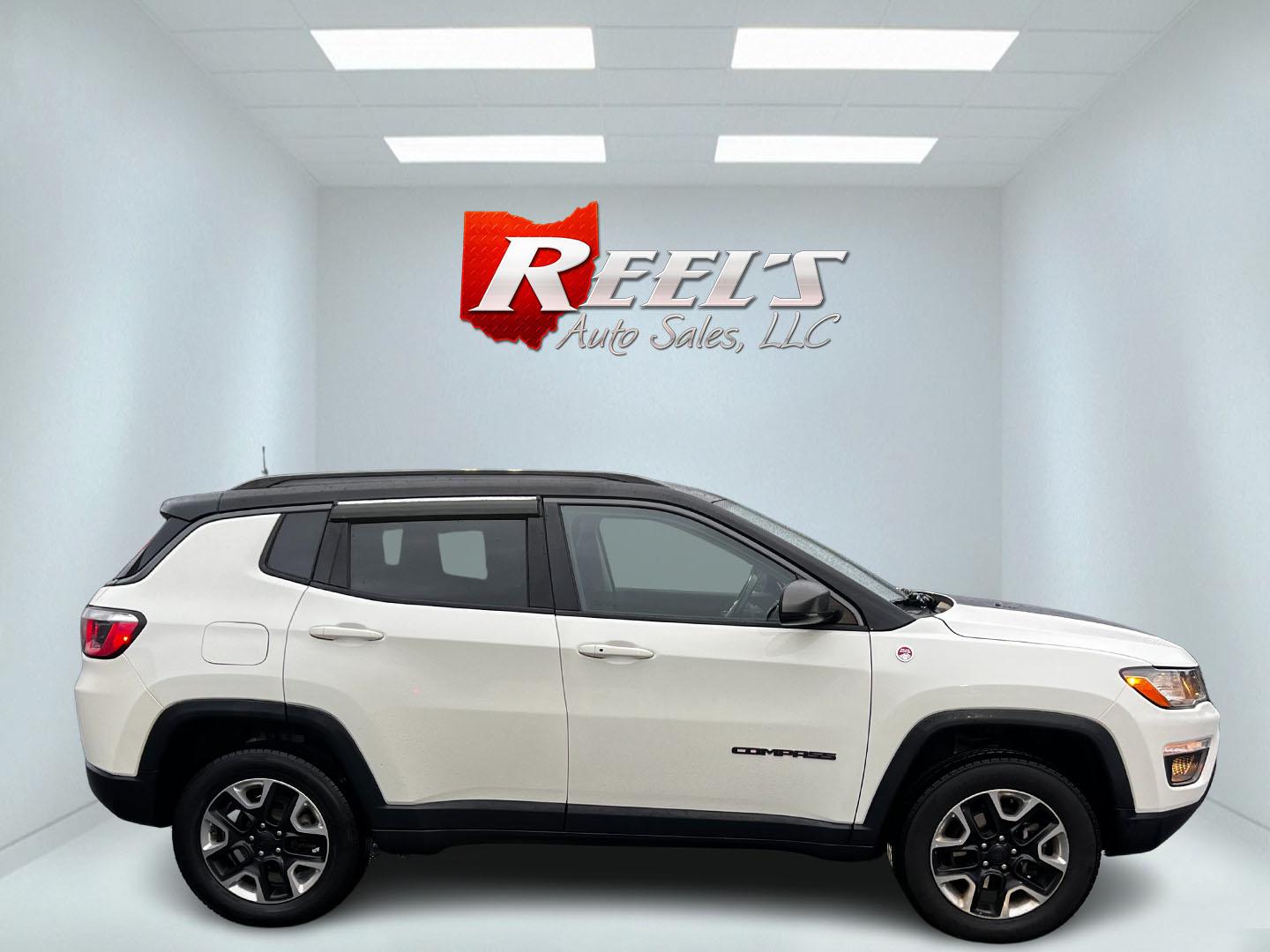 2018 White /Black Jeep Compass Trailhawk 4WD (3C4NJDDB3JT) with an 2.4L I4 DOHC 16V engine, 9 Speed Automatic transmission, located at 11115 Chardon Rd. , Chardon, OH, 44024, (440) 214-9705, 41.580246, -81.241943 - This 2018 Jeep Compass Trailhawk is designed for both rugged off-road adventures and comfortable daily driving. It is powered by a 2.4-liter I4 engine mated to a 9-speed automatic transmission, providing reliable performance and smooth gear transitions. This vehicle features an 8.4-inch touchscreen - Photo#4