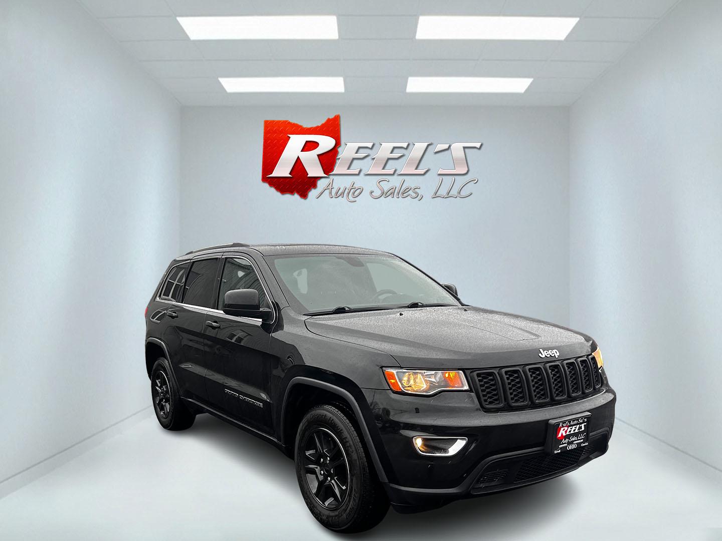 2017 Black /Black Jeep Grand Cherokee Laredo E 4WD (1C4RJFAG7HC) with an 3.6L V6 DOHC 24V engine, 8A transmission, located at 11115 Chardon Rd. , Chardon, OH, 44024, (440) 214-9705, 41.580246, -81.241943 - This 2017 Jeep Grand Cherokee Laredo E 4WD is a solid choice for those seeking a reliable and feature-rich SUV. It comes with a 3.6-liter V6 engine paired with an 8-speed automatic transmission, providing a smooth and capable driving experience. This SUV features a power driver's seat for personaliz - Photo#1