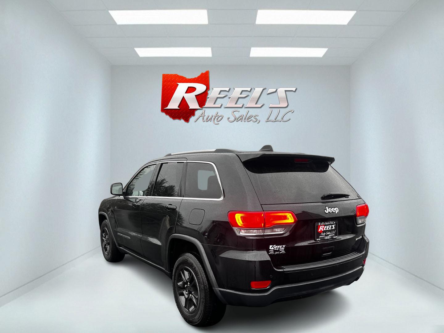 2017 Black /Black Jeep Grand Cherokee Laredo E 4WD (1C4RJFAG7HC) with an 3.6L V6 DOHC 24V engine, 8A transmission, located at 11115 Chardon Rd. , Chardon, OH, 44024, (440) 214-9705, 41.580246, -81.241943 - This 2017 Jeep Grand Cherokee Laredo E 4WD is a solid choice for those seeking a reliable and feature-rich SUV. It comes with a 3.6-liter V6 engine paired with an 8-speed automatic transmission, providing a smooth and capable driving experience. This SUV features a power driver's seat for personaliz - Photo#6