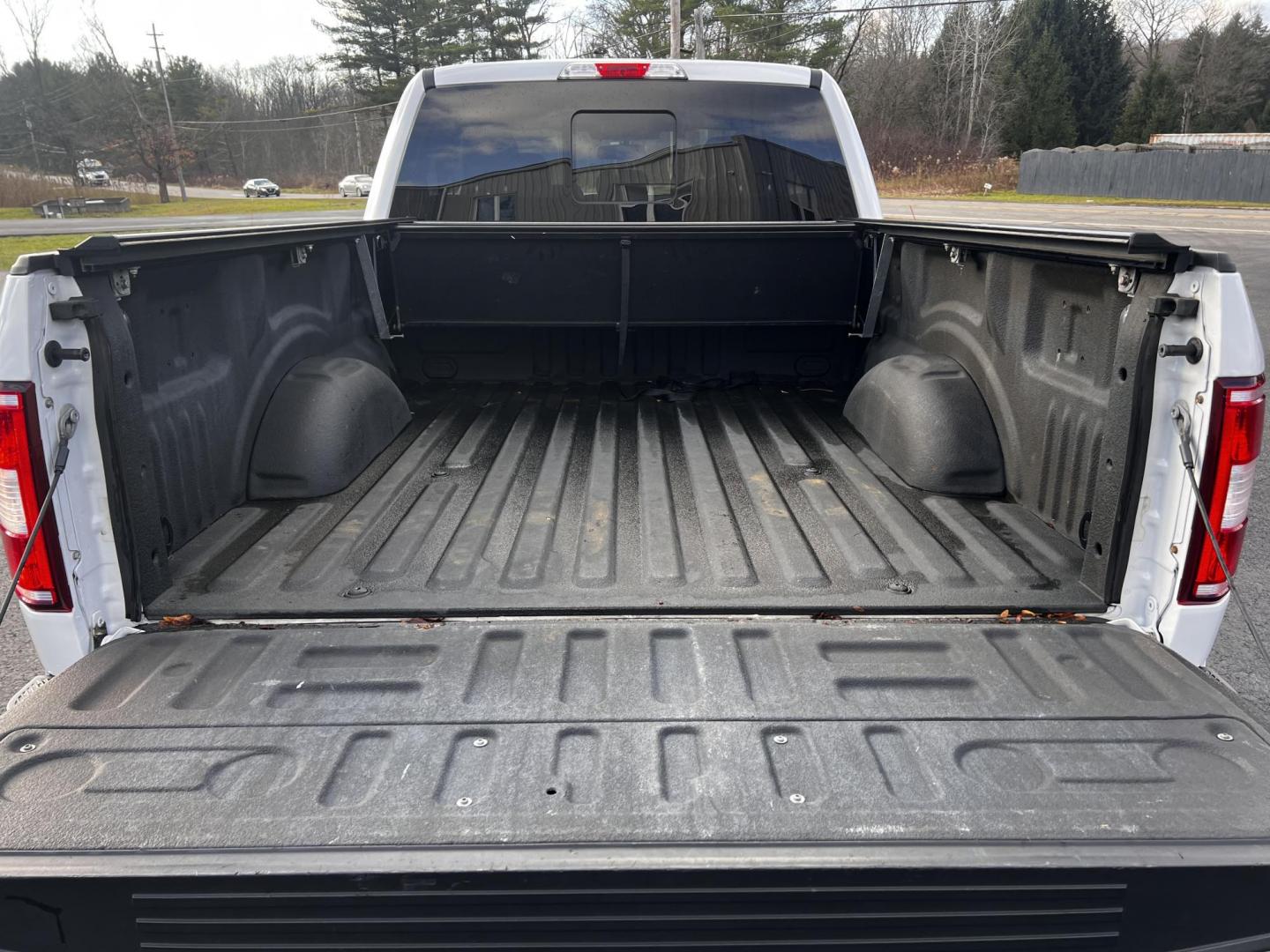 2019 White /Black Ford F-150 XLT SuperCab 6.5-ft. 4WD (1FTFX1E59KF) with an 5.0L V8 OHV 16V engine, 10 Speed Auto transmission, located at 11115 Chardon Rd. , Chardon, OH, 44024, (440) 214-9705, 41.580246, -81.241943 - This 2019 Ford F-150 XLT Supercab 4WD is a robust and versatile pickup truck ideal for both work and play. Equipped with a powerful 5.0-liter Coyote V8 engine, it delivers an impressive 395 horsepower and 400 lb-ft of torque, supporting a notable 9,100-pound towing capacity. Inside, it offers heated - Photo#12