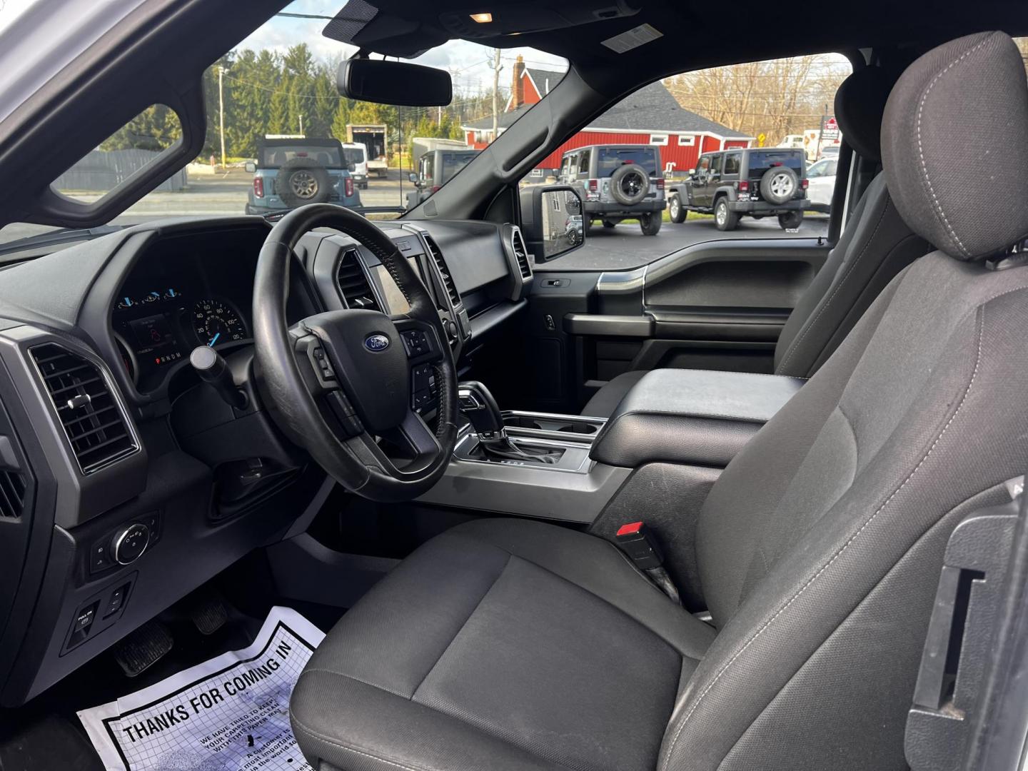 2019 White /Black Ford F-150 XLT SuperCab 6.5-ft. 4WD (1FTFX1E59KF) with an 5.0L V8 OHV 16V engine, 10 Speed Auto transmission, located at 11115 Chardon Rd. , Chardon, OH, 44024, (440) 214-9705, 41.580246, -81.241943 - This 2019 Ford F-150 XLT Supercab 4WD is a robust and versatile pickup truck ideal for both work and play. Equipped with a powerful 5.0-liter Coyote V8 engine, it delivers an impressive 395 horsepower and 400 lb-ft of torque, supporting a notable 9,100-pound towing capacity. Inside, it offers heated - Photo#19