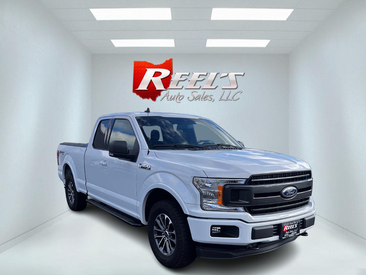 2019 White /Black Ford F-150 XLT SuperCab 6.5-ft. 4WD (1FTFX1E59KF) with an 5.0L V8 OHV 16V engine, 10 Speed Auto transmission, located at 11115 Chardon Rd. , Chardon, OH, 44024, (440) 214-9705, 41.580246, -81.241943 - This 2019 Ford F-150 XLT Supercab 4WD is a robust and versatile pickup truck ideal for both work and play. Equipped with a powerful 5.0-liter Coyote V8 engine, it delivers an impressive 395 horsepower and 400 lb-ft of torque, supporting a notable 9,100-pound towing capacity. Inside, it offers heated - Photo#2