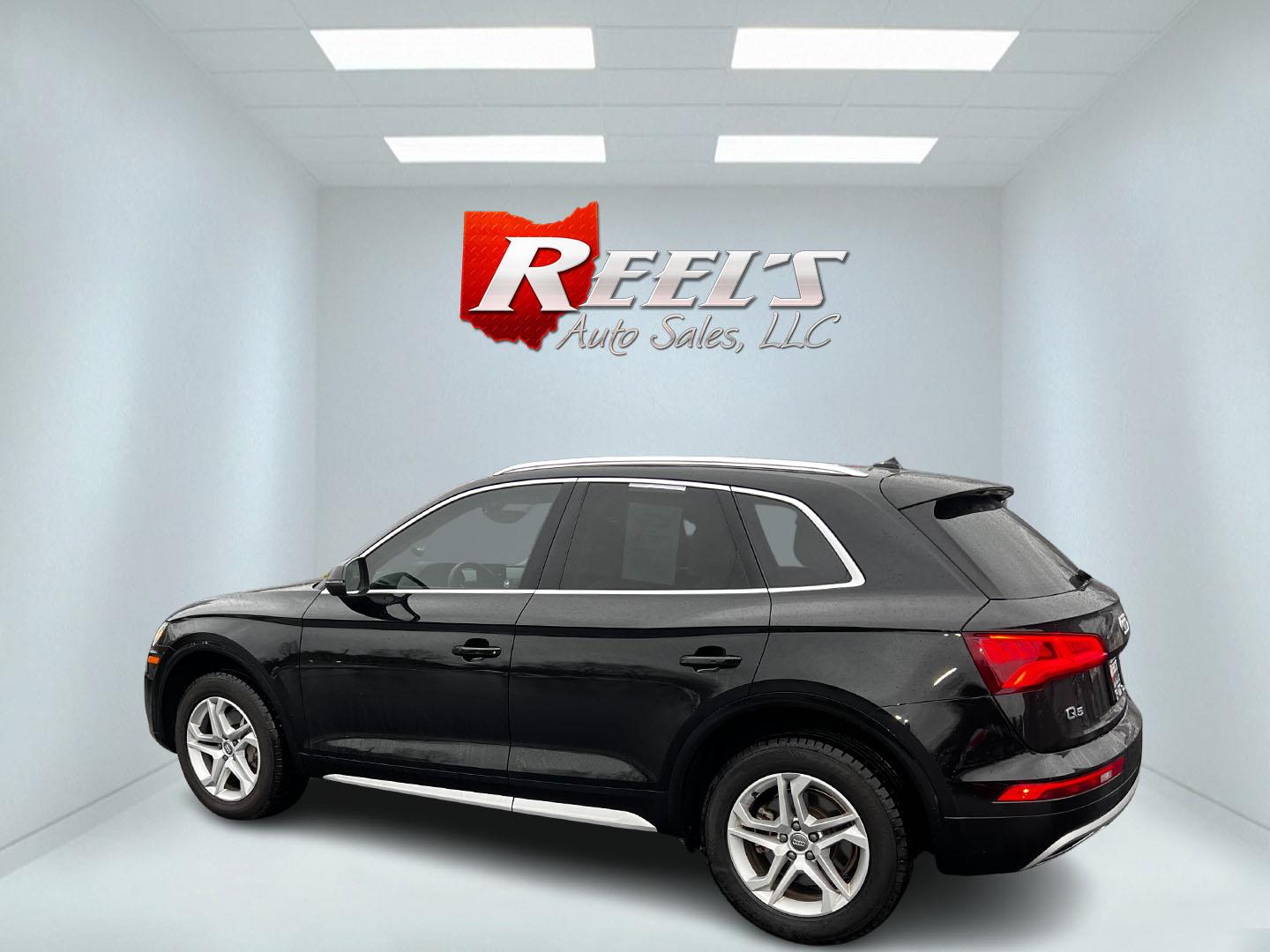 2019 Black /Tan Audi Q5 2.0T Premium quattro (WA1ANAFY8K2) with an 2.0L I4 DOHC 16V Turbo engine, 8A transmission, located at 11115 Chardon Rd. , Chardon, OH, 44024, (440) 214-9705, 41.580246, -81.241943 - This 2019 Audi Q5 Premium Quattro is a sophisticated compact SUV that blends performance, luxury, and cutting-edge technology. Powered by a 2.0-liter turbocharged I4 engine and a 7-speed automatic transmission, it achieves a commendable 0-60 mph in just 5.9 seconds, while delivering efficient fuel e - Photo#8