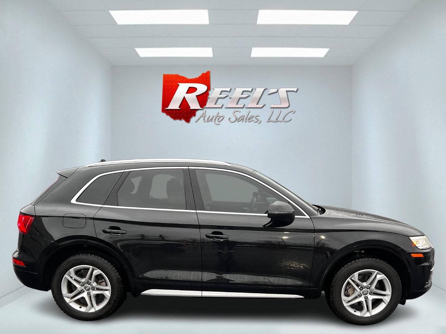 2019 Black /Tan Audi Q5 2.0T Premium quattro (WA1ANAFY8K2) with an 2.0L I4 DOHC 16V Turbo engine, 8A transmission, located at 11115 Chardon Rd. , Chardon, OH, 44024, (440) 214-9705, 41.580246, -81.241943 - This 2019 Audi Q5 Premium Quattro is a sophisticated compact SUV that blends performance, luxury, and cutting-edge technology. Powered by a 2.0-liter turbocharged I4 engine and a 7-speed automatic transmission, it achieves a commendable 0-60 mph in just 5.9 seconds, while delivering efficient fuel e - Photo#4