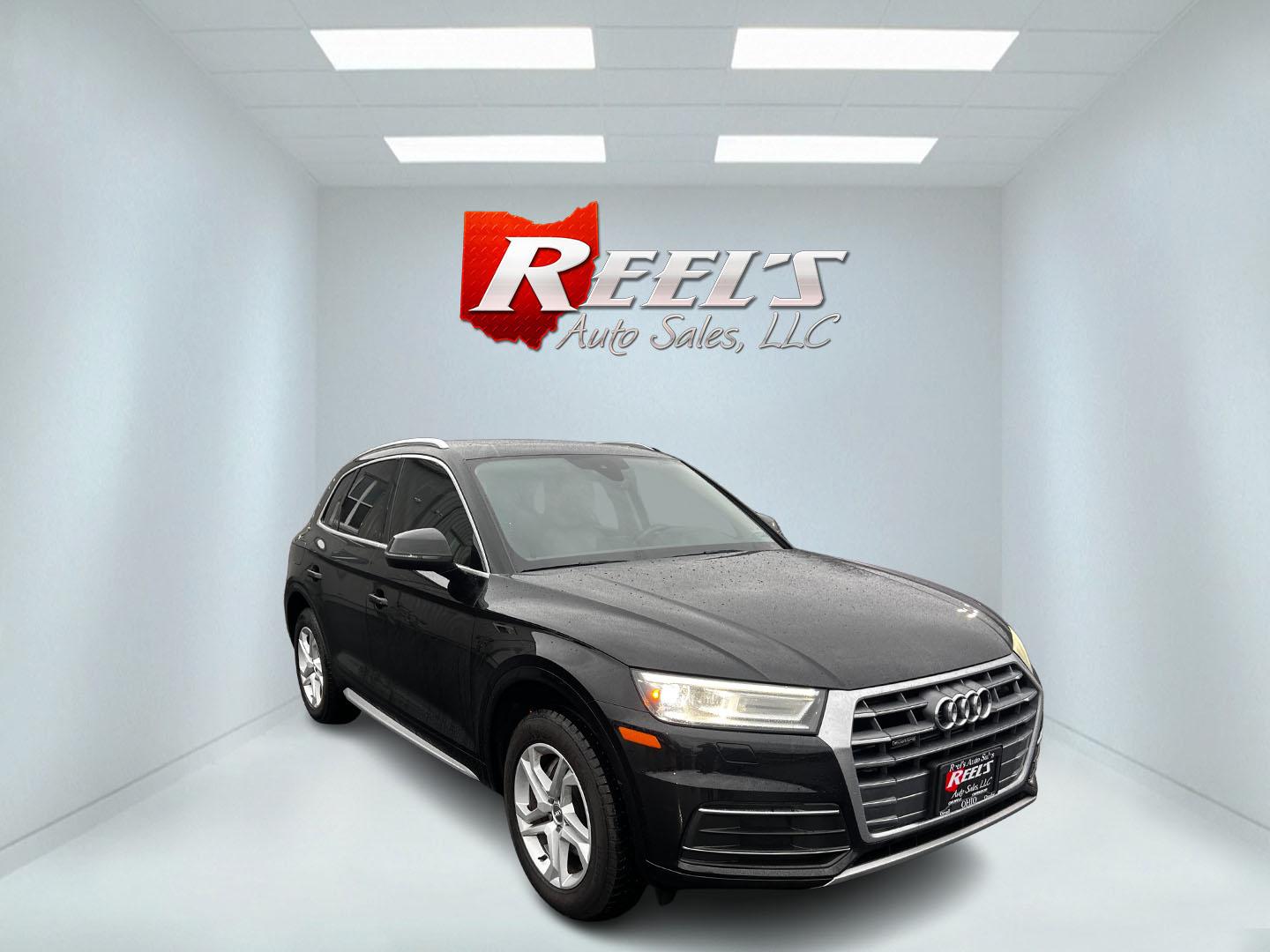 2019 Black /Tan Audi Q5 2.0T Premium quattro (WA1ANAFY8K2) with an 2.0L I4 DOHC 16V Turbo engine, 8A transmission, located at 11115 Chardon Rd. , Chardon, OH, 44024, (440) 214-9705, 41.580246, -81.241943 - This 2019 Audi Q5 Premium Quattro is a sophisticated compact SUV that blends performance, luxury, and cutting-edge technology. Powered by a 2.0-liter turbocharged I4 engine and a 7-speed automatic transmission, it achieves a commendable 0-60 mph in just 5.9 seconds, while delivering efficient fuel e - Photo#2