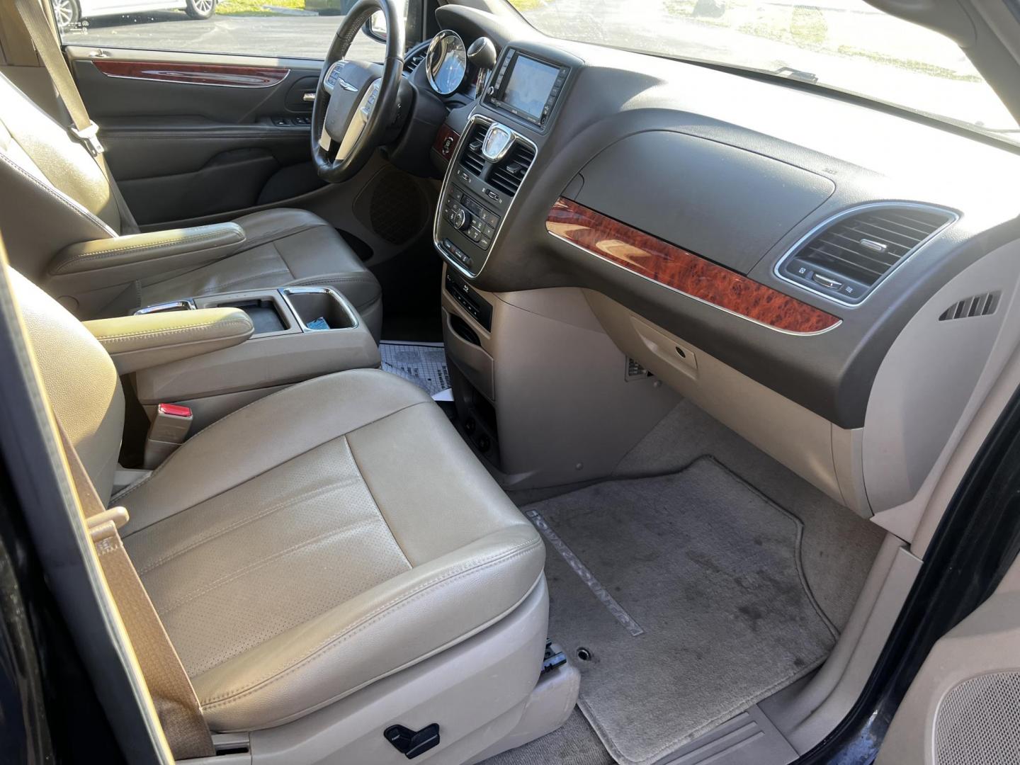 2014 Black /Brown Chrysler Town & Country Touring-L (2C4RC1CG2ER) with an 3.6L V6 DOHC 24V FFV engine, 6-Speed Automatic transmission, located at 11115 Chardon Rd. , Chardon, OH, 44024, (440) 214-9705, 41.580246, -81.241943 - This 2014 Chrysler Town & Country Touring-L is a versatile minivan designed for family comfort and convenience. It is powered by a 3.6-liter V6 engine, paired with a 6-speed automatic transmission, ensuring a smooth and reliable driving experience. Featuring a well-appointed leather interior, it off - Photo#41