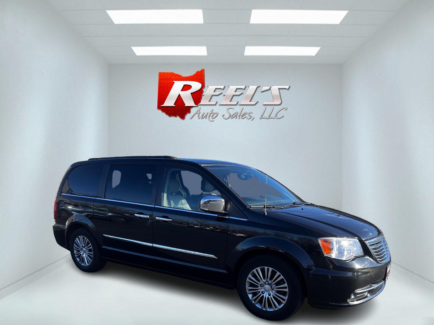 2014 Black /Brown Chrysler Town & Country Touring-L (2C4RC1CG2ER) with an 3.6L V6 DOHC 24V FFV engine, 6-Speed Automatic transmission, located at 11115 Chardon Rd. , Chardon, OH, 44024, (440) 214-9705, 41.580246, -81.241943 - This 2014 Chrysler Town & Country Touring-L is a versatile minivan designed for family comfort and convenience. It is powered by a 3.6-liter V6 engine, paired with a 6-speed automatic transmission, ensuring a smooth and reliable driving experience. Featuring a well-appointed leather interior, it off - Photo#3