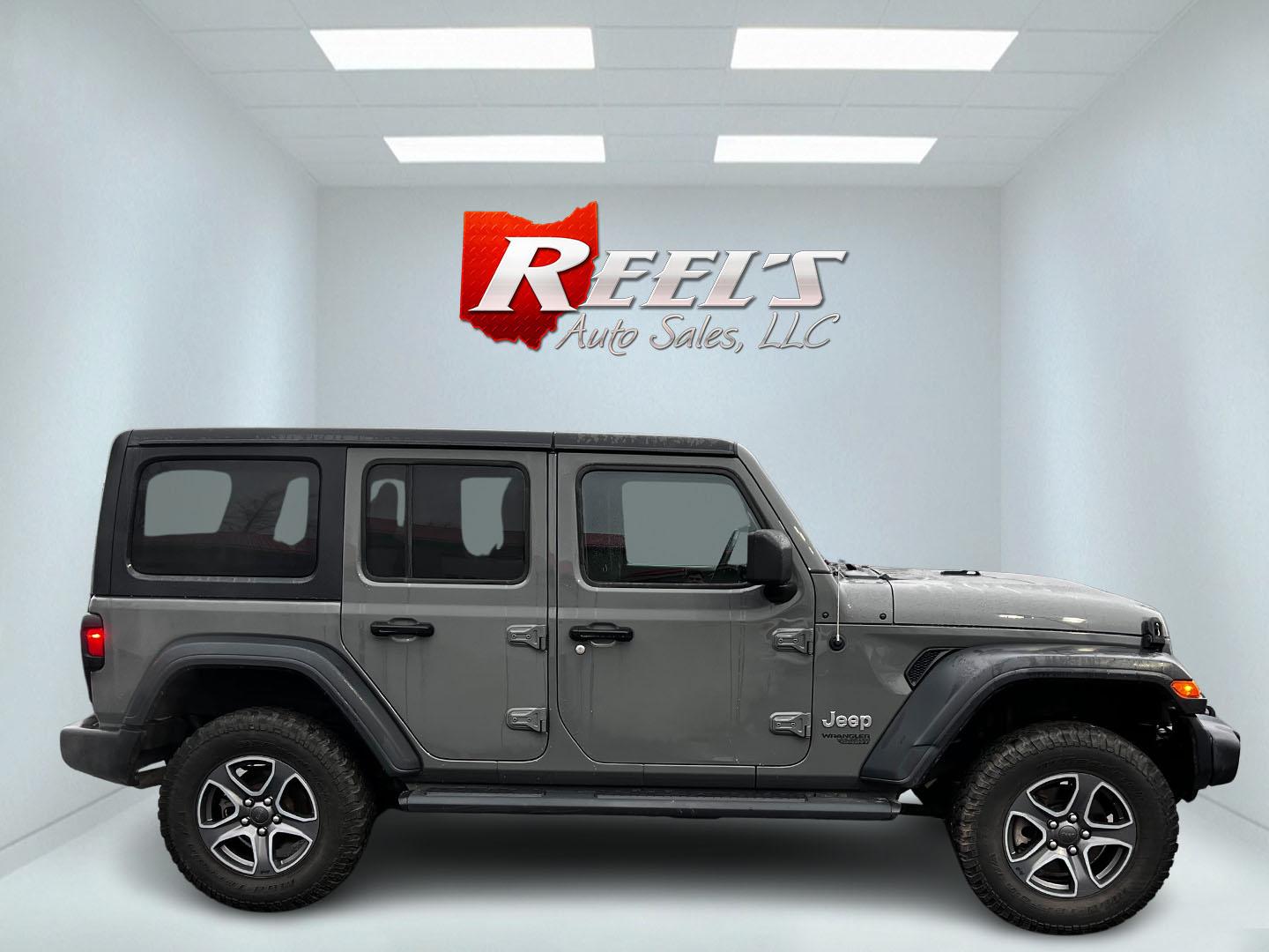 2019 Gray /Black Jeep Wrangler Unlimited Sport S (1C4HJXDG2KW) with an 3.6L V6 DOHC 24V engine, 8-Speed Automatic transmission, located at 547 E. Main St., Orwell, OH, 44076, (440) 437-5893, 41.535435, -80.847855 - This 2019 Jeep Wrangler Unlimited Sport S is a versatile SUV offering a 3.6-liter V6 engine paired with an 8-speed automatic transmission, providing a blend of power and smooth handling suitable for a variety of terrains. It comes equipped with features like heated front seats and remote start for a - Photo#4