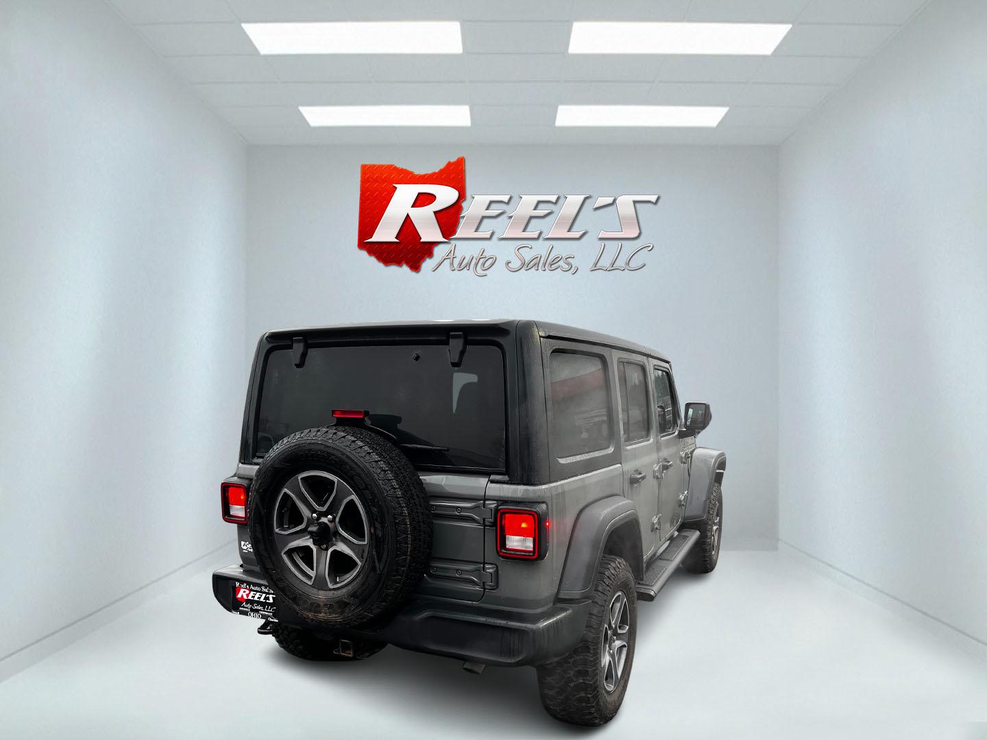 2019 Gray /Black Jeep Wrangler Unlimited Sport S (1C4HJXDG2KW) with an 3.6L V6 DOHC 24V engine, 8-Speed Automatic transmission, located at 547 E. Main St., Orwell, OH, 44076, (440) 437-5893, 41.535435, -80.847855 - This 2019 Jeep Wrangler Unlimited Sport S is a versatile SUV offering a 3.6-liter V6 engine paired with an 8-speed automatic transmission, providing a blend of power and smooth handling suitable for a variety of terrains. It comes equipped with features like heated front seats and remote start for a - Photo#5