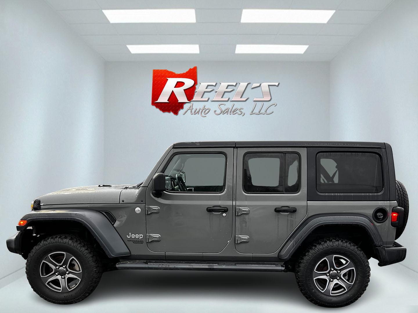 2019 Gray /Black Jeep Wrangler Unlimited Sport S (1C4HJXDG2KW) with an 3.6L V6 DOHC 24V engine, 8-Speed Automatic transmission, located at 547 E. Main St., Orwell, OH, 44076, (440) 437-5893, 41.535435, -80.847855 - This 2019 Jeep Wrangler Unlimited Sport S is a versatile SUV offering a 3.6-liter V6 engine paired with an 8-speed automatic transmission, providing a blend of power and smooth handling suitable for a variety of terrains. It comes equipped with features like heated front seats and remote start for a - Photo#9