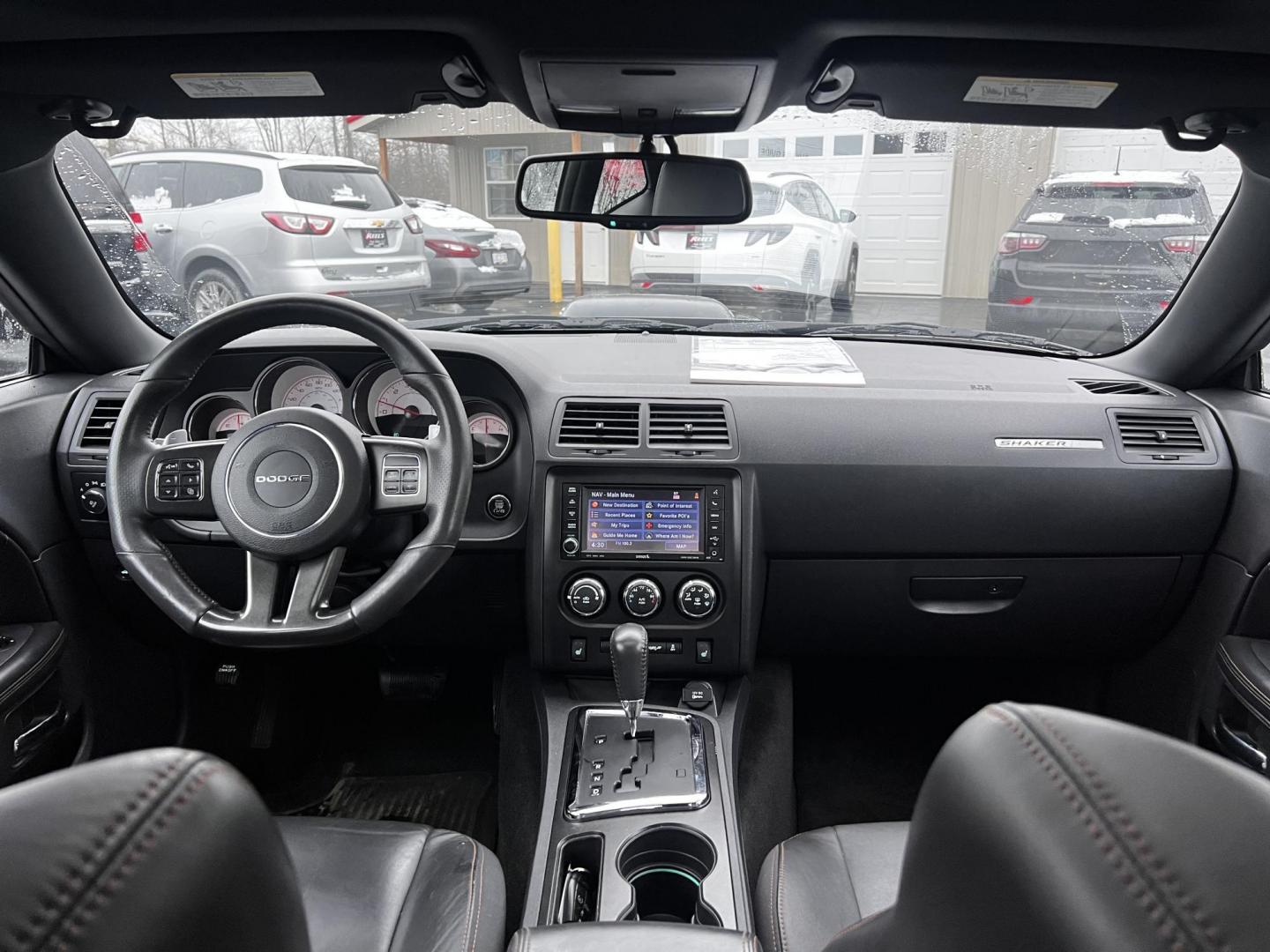 2014 Black /Black Dodge Challenger R/T Shacker (2C3CDYBT8EH) with an 5.7L V8 OHV 16V engine, 5 Speed Auto transmission, located at 547 E. Main St., Orwell, OH, 44076, (440) 437-5893, 41.535435, -80.847855 - This 2014 Dodge Challenger R/T Shaker is a powerful and stylish muscle car featuring a robust 5.7-liter HEMI V8 engine paired with a 5-speed automatic transmission. It delivers impressive performance with 372 horsepower and 400 lb-ft of torque, achieving 0-60 mph in about 5.5 seconds. This vehicle i - Photo#35