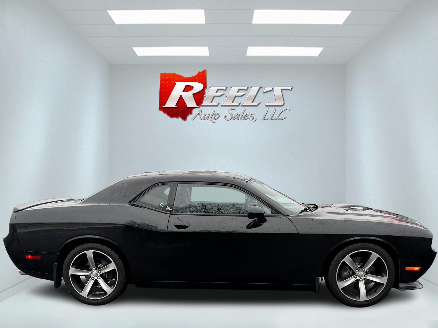 2014 Black /Black Dodge Challenger R/T Shacker (2C3CDYBT8EH) with an 5.7L V8 OHV 16V engine, 5 Speed Auto transmission, located at 547 E. Main St., Orwell, OH, 44076, (440) 437-5893, 41.535435, -80.847855 - This 2014 Dodge Challenger R/T Shaker is a powerful and stylish muscle car featuring a robust 5.7-liter HEMI V8 engine paired with a 5-speed automatic transmission. It delivers impressive performance with 372 horsepower and 400 lb-ft of torque, achieving 0-60 mph in about 5.5 seconds. This vehicle i - Photo#4