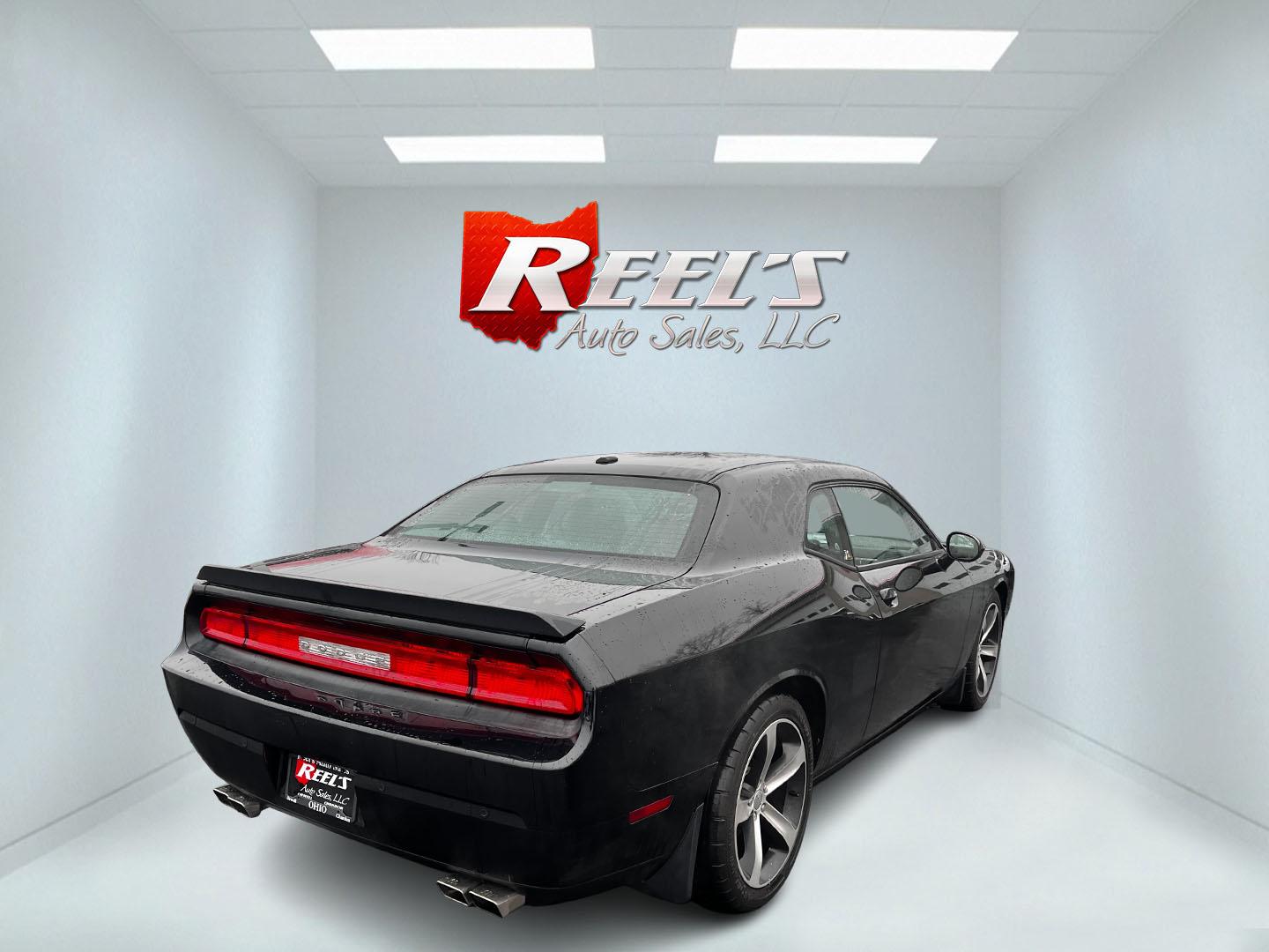 2014 Black /Black Dodge Challenger R/T Shacker (2C3CDYBT8EH) with an 5.7L V8 OHV 16V engine, 5 Speed Auto transmission, located at 547 E. Main St., Orwell, OH, 44076, (440) 437-5893, 41.535435, -80.847855 - This 2014 Dodge Challenger R/T Shaker is a powerful and stylish muscle car featuring a robust 5.7-liter HEMI V8 engine paired with a 5-speed automatic transmission. It delivers impressive performance with 372 horsepower and 400 lb-ft of torque, achieving 0-60 mph in about 5.5 seconds. This vehicle i - Photo#5