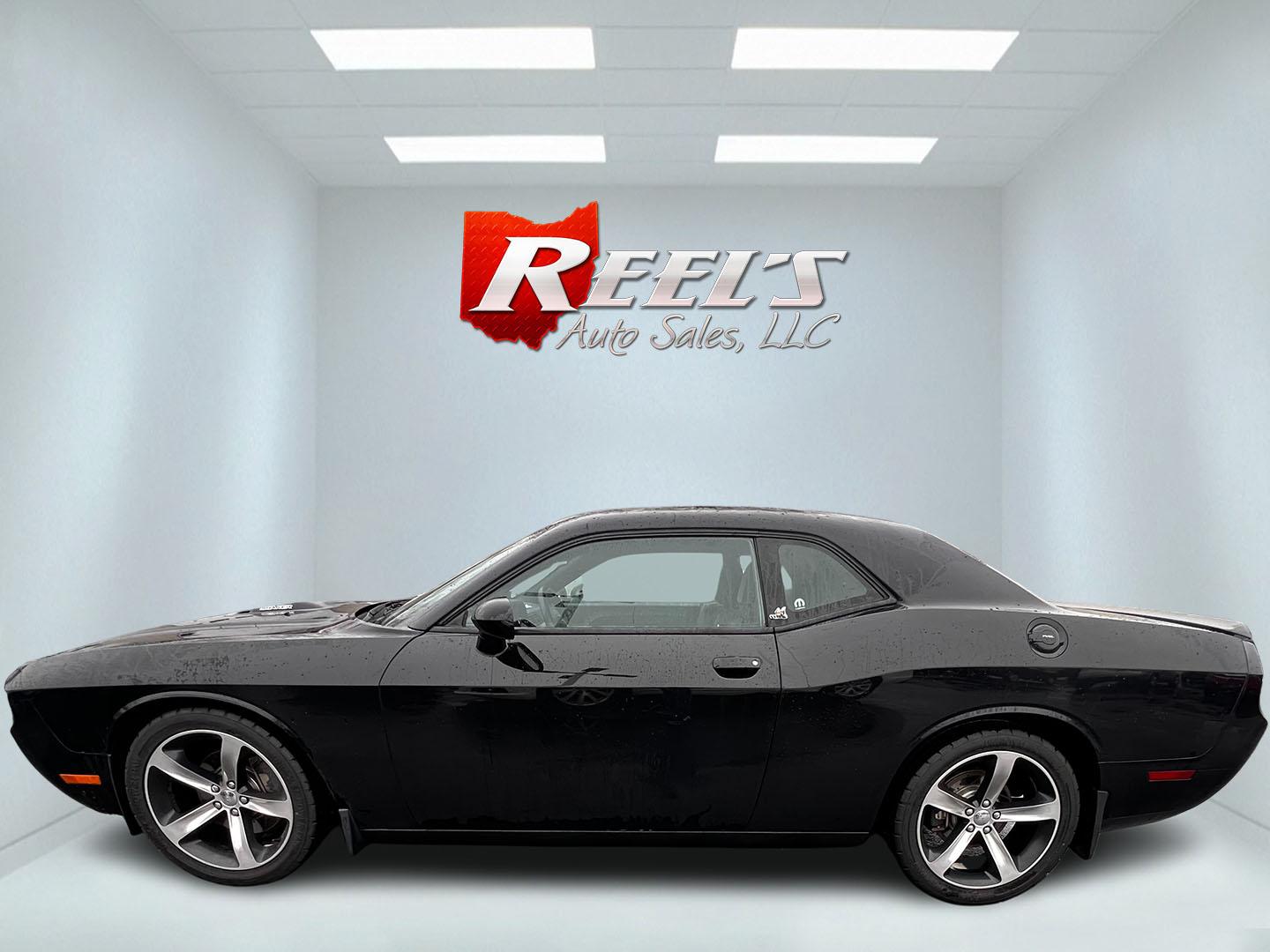 2014 Black /Black Dodge Challenger R/T Shacker (2C3CDYBT8EH) with an 5.7L V8 OHV 16V engine, 5 Speed Auto transmission, located at 547 E. Main St., Orwell, OH, 44076, (440) 437-5893, 41.535435, -80.847855 - This 2014 Dodge Challenger R/T Shaker is a powerful and stylish muscle car featuring a robust 5.7-liter HEMI V8 engine paired with a 5-speed automatic transmission. It delivers impressive performance with 372 horsepower and 400 lb-ft of torque, achieving 0-60 mph in about 5.5 seconds. This vehicle i - Photo#9