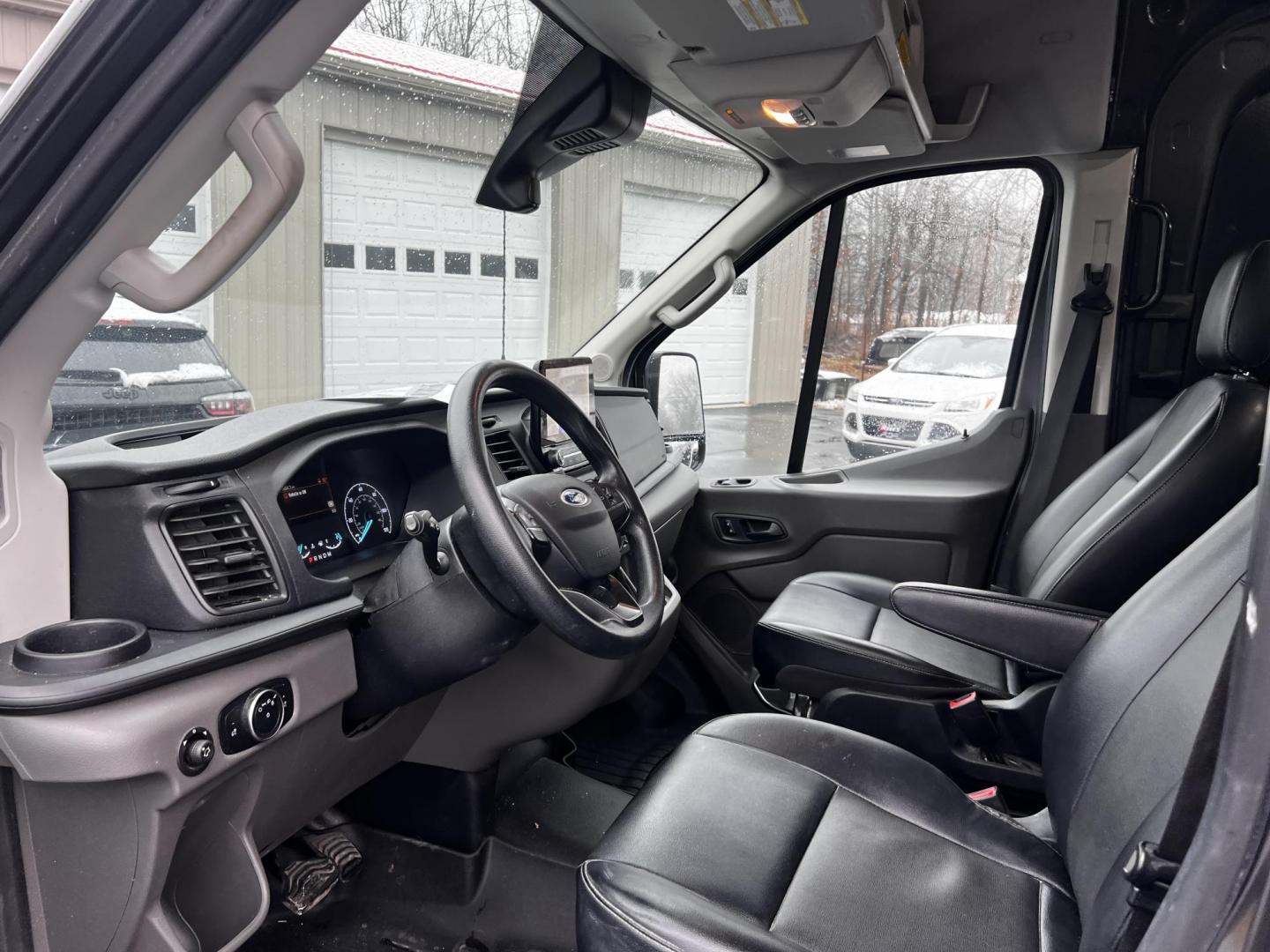 2020 Gray /Black Ford Transit 250 Van Med. Roof w/Sliding Pass. 148-in. WB (1FTBR2C87LK) with an 3.5L V6 DOHC 24V FFV engine, 10 Speed Auto transmission, located at 11115 Chardon Rd. , Chardon, OH, 44024, (440) 214-9705, 41.580246, -81.241943 - This One Owner 2020 Ford Transit T250 AWD is a versatile and capable van, featuring a 3.5-liter V6 engine coupled with a 10-speed automatic transmission, which ensures smooth and efficient performance. It's equipped with modern safety and convenience features, including daytime running lights, dusk- - Photo#16