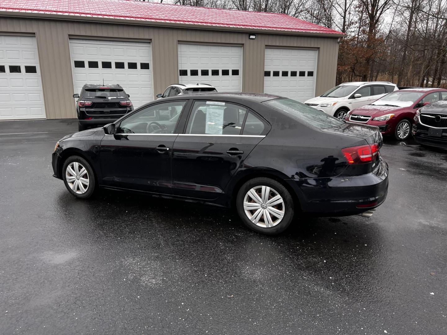 2017 Black /Gray Volkswagen Jetta 1.4T S 6A (3VW2B7AJ1HM) with an 1.4L I4 DOHC 20V Turbo engine, 6 Speed Automatic transmission, located at 547 E. Main St., Orwell, OH, 44076, (440) 437-5893, 41.535435, -80.847855 - Photo#10