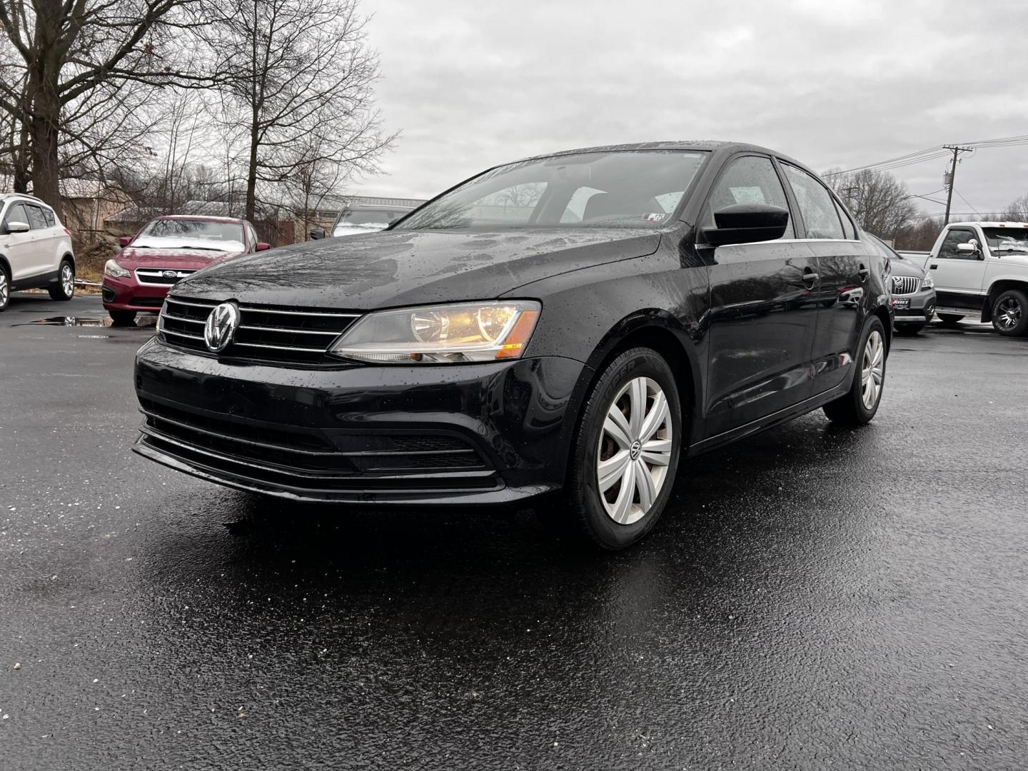 2017 Black /Gray Volkswagen Jetta 1.4T S 6A (3VW2B7AJ1HM) with an 1.4L I4 DOHC 20V Turbo engine, 6 Speed Automatic transmission, located at 547 E. Main St., Orwell, OH, 44076, (440) 437-5893, 41.535435, -80.847855 - Photo#0