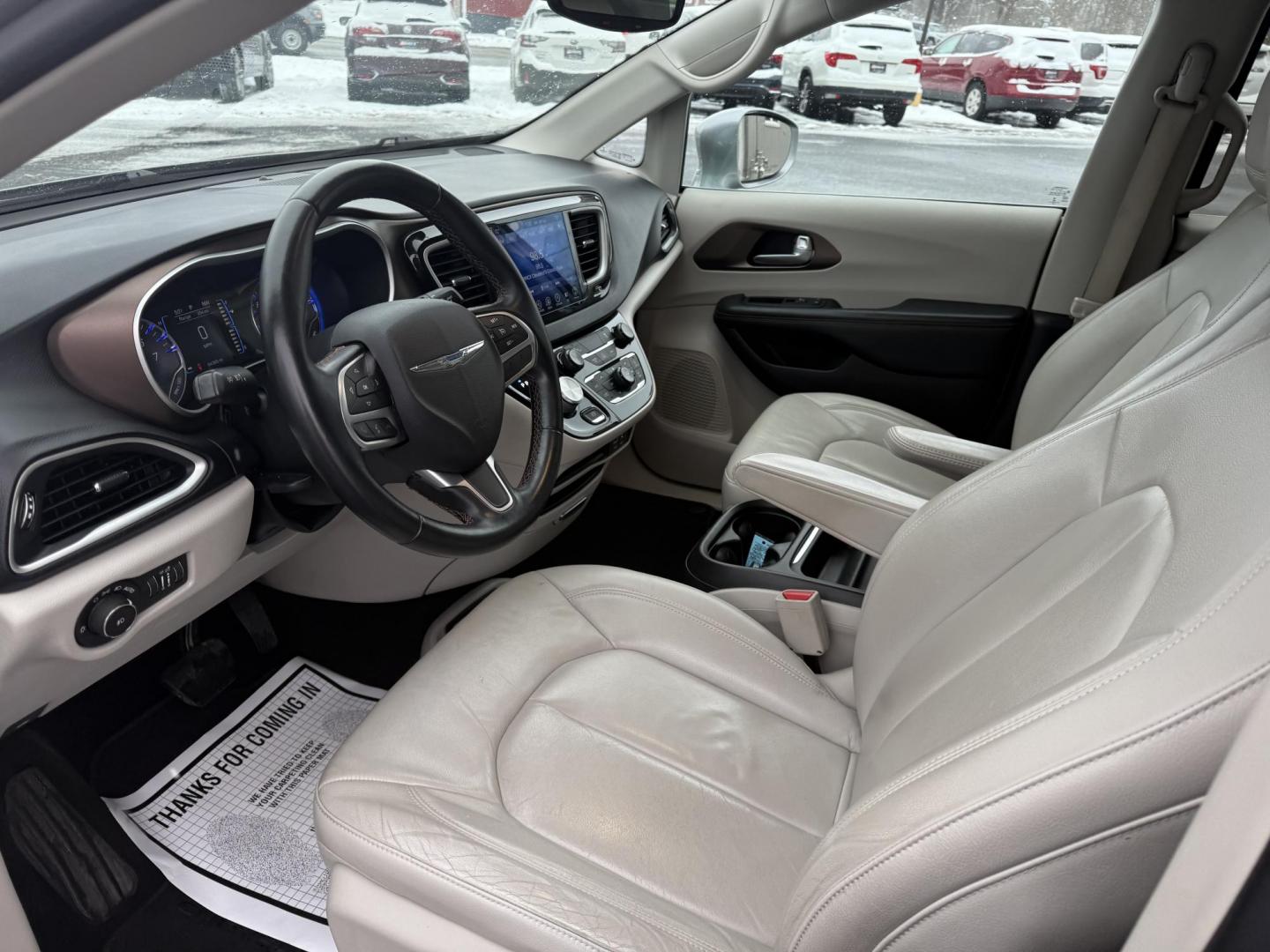 2017 Silver /White Chrysler Pacifica Touring-L (2C4RC1BG3HR) with an 3.6L V6 DOHC 24V engine, 9 Speed Automatic transmission, located at 11115 Chardon Rd. , Chardon, OH, 44024, (440) 214-9705, 41.580246, -81.241943 - This 2017 Chrysler Pacifica Touring-L is a versatile minivan that combines efficiency, comfort, and modern features, making it an ideal choice for families. Powered by a 3.6-liter Pentastar V6 engine paired with a 9-speed automatic transmission, it offers a comfortable ride with an impressive highwa - Photo#4