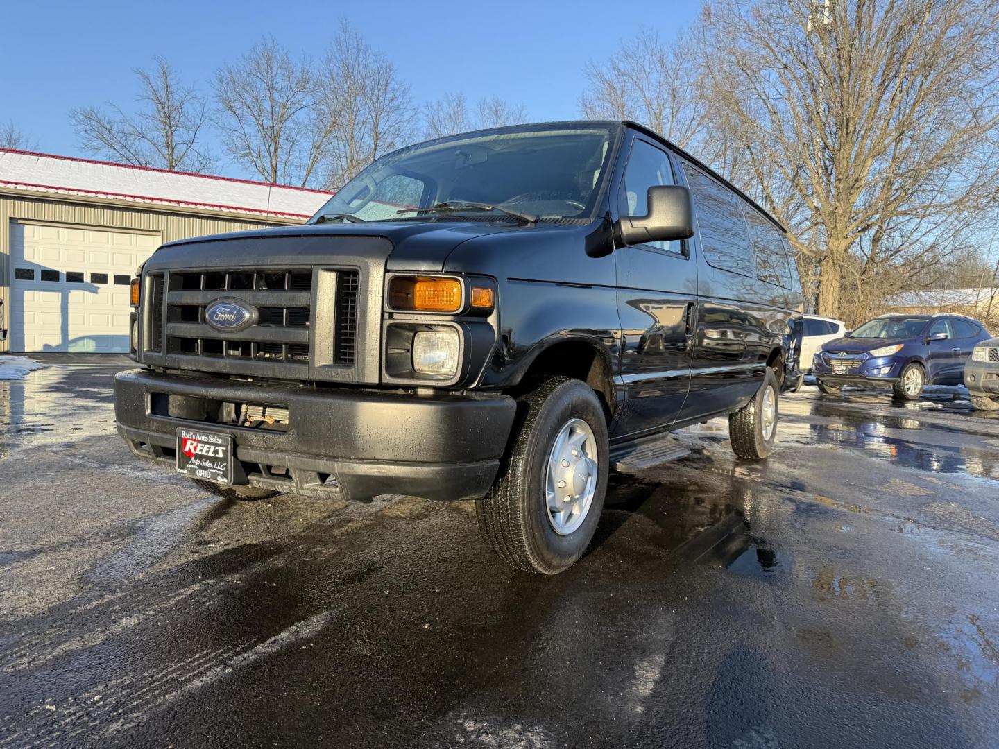 2014 Black /Gray Ford E-Series Wagon E-350 XL Super Duty Extended (1FBSS3BL8ED) with an 5.4L V8 SOHC 16V FFV engine, 4-Speed Automatic with Overdrive transmission, located at 547 E. Main St., Orwell, OH, 44076, (440) 437-5893, 41.535435, -80.847855 - Photo#0