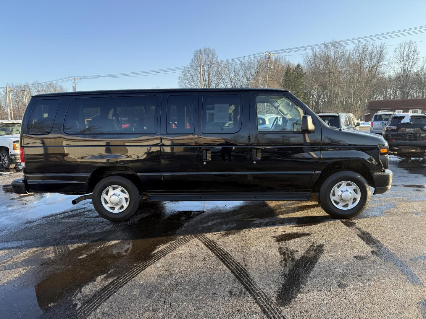 2014 Black /Gray Ford E-Series Wagon E-350 XL Super Duty Extended (1FBSS3BL8ED) with an 5.4L V8 SOHC 16V FFV engine, 4-Speed Automatic with Overdrive transmission, located at 547 E. Main St., Orwell, OH, 44076, (440) 437-5893, 41.535435, -80.847855 - This CLEAN One Owner Low Miles 2014 Ford E350 XL is a robust 15-passenger van ideal for group transportation needs, powered by a 5.4 Triton V8 engine paired with a 4-speed automatic transmission. Its flex-fuel capability offers flexibility with fuel choices, while the 3.73 gearing aids in optimizing - Photo#18