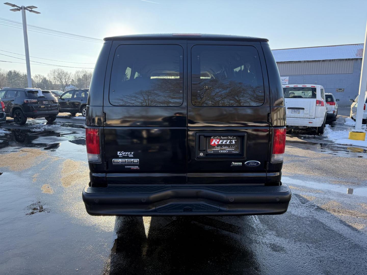 2014 Black /Gray Ford E-Series Wagon E-350 XL Super Duty Extended (1FBSS3BL8ED) with an 5.4L V8 SOHC 16V FFV engine, 4-Speed Automatic with Overdrive transmission, located at 547 E. Main St., Orwell, OH, 44076, (440) 437-5893, 41.535435, -80.847855 - This CLEAN One Owner Low Miles 2014 Ford E350 XL is a robust 15-passenger van ideal for group transportation needs, powered by a 5.4 Triton V8 engine paired with a 4-speed automatic transmission. Its flex-fuel capability offers flexibility with fuel choices, while the 3.73 gearing aids in optimizing - Photo#20