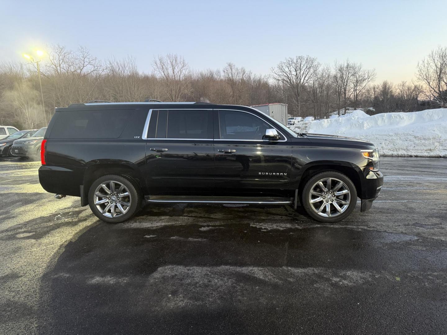 2016 Black /Black Chevrolet Suburban LTZ 4WD (1GNSKJKC4GR) with an 5.3L V8 OHV 16V engine, 6A transmission, located at 11115 Chardon Rd. , Chardon, OH, 44024, (440) 214-9705, 41.580246, -81.241943 - This One Owner 2016 Chevrolet Suburban LTZ is a robust full-size SUV featuring a 5.3L Vortec V8 engine paired with a 6-speed automatic transmission and 3.42 gearing to deliver an impressive 8,000-pound towing capacity, while its modern amenities—an 8.0-inch touchscreen with Apple CarPlay and Andro - Photo#5