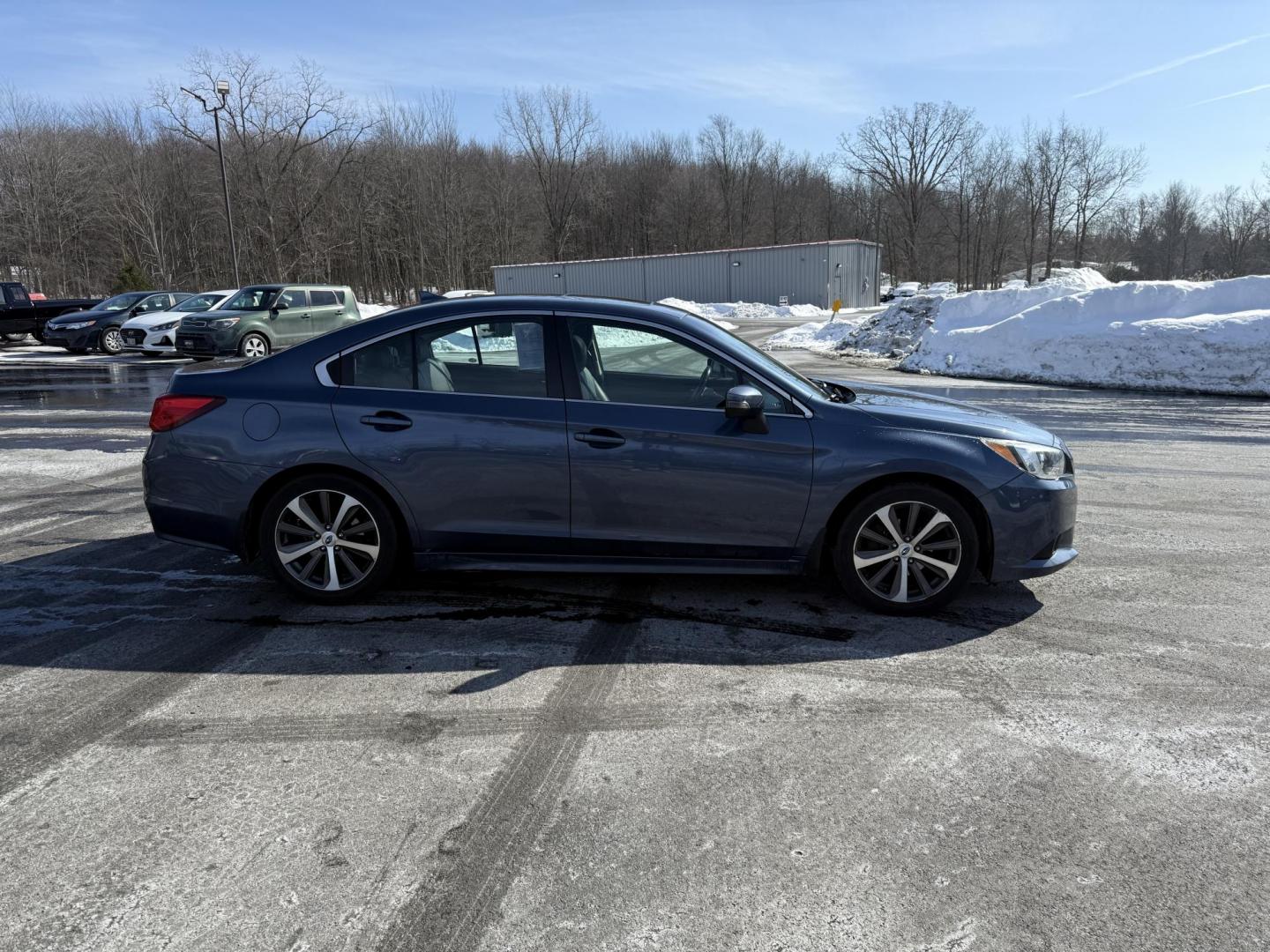 2017 Blue /Black Subaru Legacy 2.5i Limited (4S3BNAK63H3) with an 2.5L H4 SOHC 16V engine, Automatic transmission, located at 11115 Chardon Rd. , Chardon, OH, 44024, (440) 214-9705, 41.580246, -81.241943 - This One Owner 2017 Subaru Legacy 2.5i Limited is a well-rounded vehicle that offers a comprehensive package of performance, comfort, and safety features. It is powered by a 2.5 H4 engine and equipped with Subaru's dependable Symmetrical AWD system, which enhances stability and traction. The interio - Photo#5