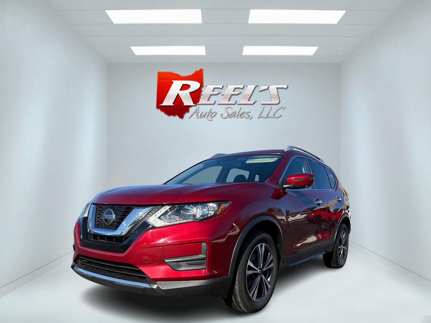 2020 Red /Black Nissan Rogue SV AWD (5N1AT2MV4LC) with an 2.5L I4 DOHC 16V engine, Automatic transmission, located at 11115 Chardon Rd. , Chardon, OH, 44024, (440) 214-9705, 41.580246, -81.241943 - This 2020 Nissan Rogue SV AWD offers a balanced blend of features for comfort and efficiency. Its 2.4-liter I4 engine is paired with ECO and Sport modes, allowing drivers to choose between fuel efficiency and enhanced performance, achieving around 32 MPG on the highway. The vehicle is equipped with - Photo#0