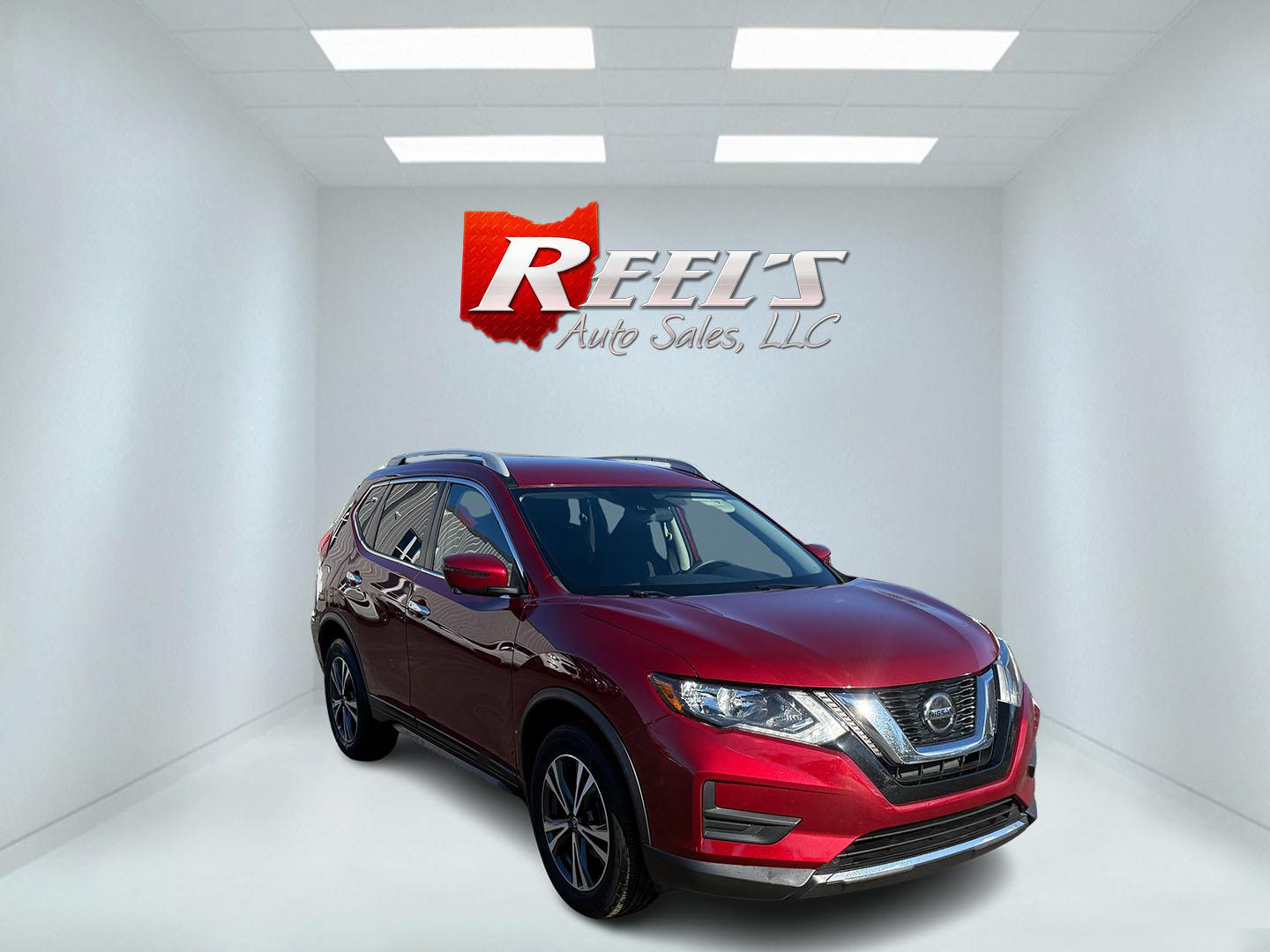 2020 Red /Black Nissan Rogue SV AWD (5N1AT2MV4LC) with an 2.5L I4 DOHC 16V engine, Automatic transmission, located at 11115 Chardon Rd. , Chardon, OH, 44024, (440) 214-9705, 41.580246, -81.241943 - This 2020 Nissan Rogue SV AWD offers a balanced blend of features for comfort and efficiency. Its 2.4-liter I4 engine is paired with ECO and Sport modes, allowing drivers to choose between fuel efficiency and enhanced performance, achieving around 32 MPG on the highway. The vehicle is equipped with - Photo#2