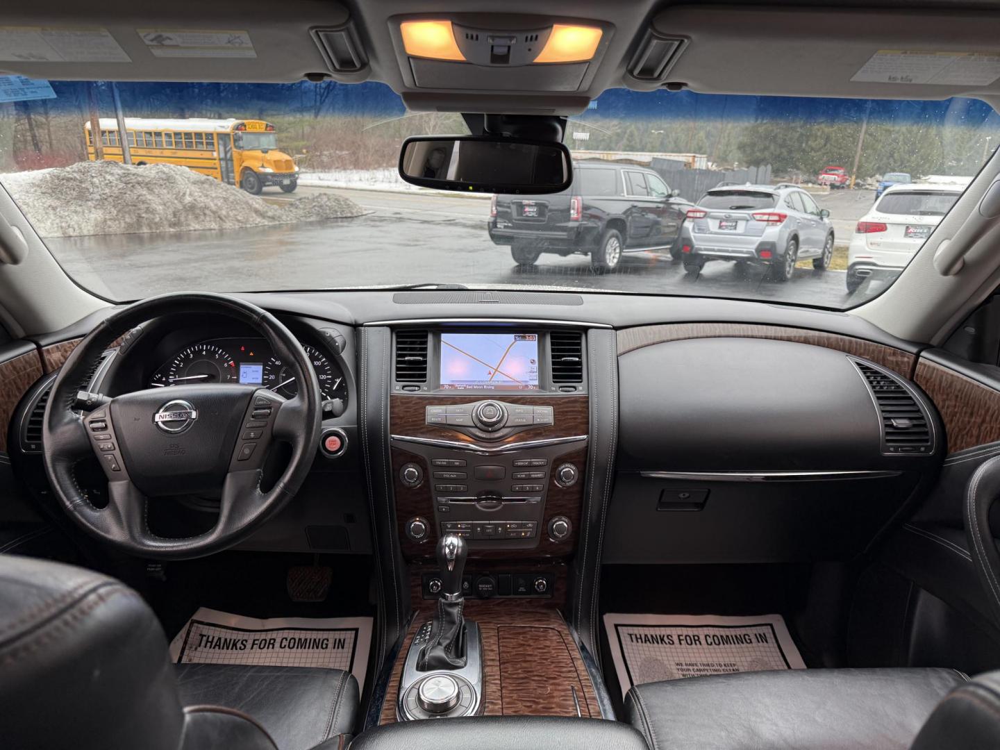 2017 White /Black Nissan Armada Platinum AWD (JN8AY2NE7H9) with an 5.6L V8 DOHC 32V engine, 7A transmission, located at 11115 Chardon Rd. , Chardon, OH, 44024, (440) 214-9705, 41.580246, -81.241943 - This 2017 Nissan Armada Platinum 4WD is a robust and luxurious full-size SUV designed to deliver both power and comfort. Equipped with a 390 HP 5.6-liter Endurance V8 engine paired with a 7-speed automatic transmission, this vehicle provides a commendable 8,500-pound towing capacity, making it suita - Photo#18