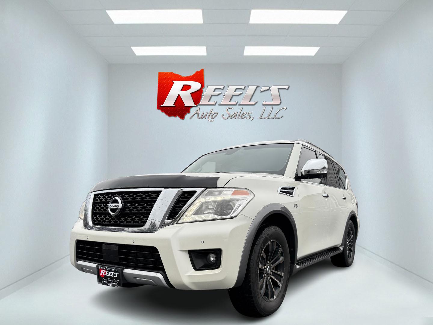 2017 White /Black Nissan Armada Platinum AWD (JN8AY2NE7H9) with an 5.6L V8 DOHC 32V engine, 7A transmission, located at 11115 Chardon Rd. , Chardon, OH, 44024, (440) 214-9705, 41.580246, -81.241943 - This 2017 Nissan Armada Platinum 4WD is a robust and luxurious full-size SUV designed to deliver both power and comfort. Equipped with a 390 HP 5.6-liter Endurance V8 engine paired with a 7-speed automatic transmission, this vehicle provides a commendable 8,500-pound towing capacity, making it suita - Photo#0