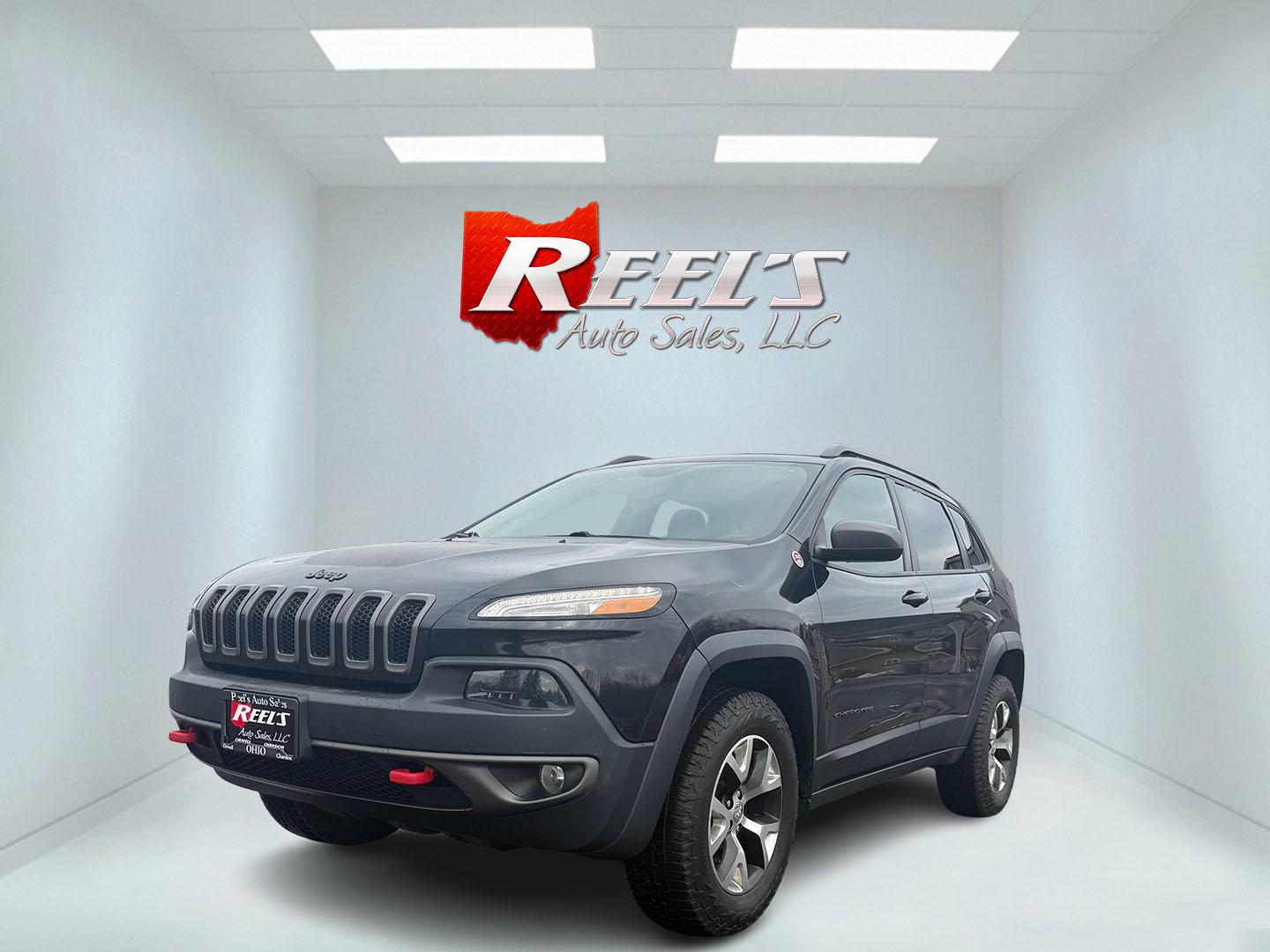 2015 Black /Black Jeep Cherokee Trailhawk 4WD (1C4PJMBB4FW) with an 2.4L I4 DOHC 16V engine, 9-Speed Automatic transmission, located at 11115 Chardon Rd. , Chardon, OH, 44024, (440) 214-9705, 41.580246, -81.241943 - This 2015 Jeep Cherokee Trailhawk is a robust choice for off-road enthusiasts, featuring a 2.4L I4 engine and a sophisticated Active Drive Lock system with a locking rear differential, ensuring enhanced off-road traction and performance. Its Trail Rated capability, coupled with 8.7 inches of ground - Photo#0