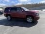 2017 Red /Black Chevrolet Tahoe LT 4WD (1GNSKBKC3HR) with an 5.3L V8 OHV 16V engine, 6A transmission, located at 11115 Chardon Rd. , Chardon, OH, 44024, (440) 214-9705, 41.580246, -81.241943 - Photo#3