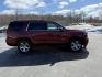 2017 Red /Black Chevrolet Tahoe LT 4WD (1GNSKBKC3HR) with an 5.3L V8 OHV 16V engine, 6A transmission, located at 11115 Chardon Rd. , Chardon, OH, 44024, (440) 214-9705, 41.580246, -81.241943 - Photo#5