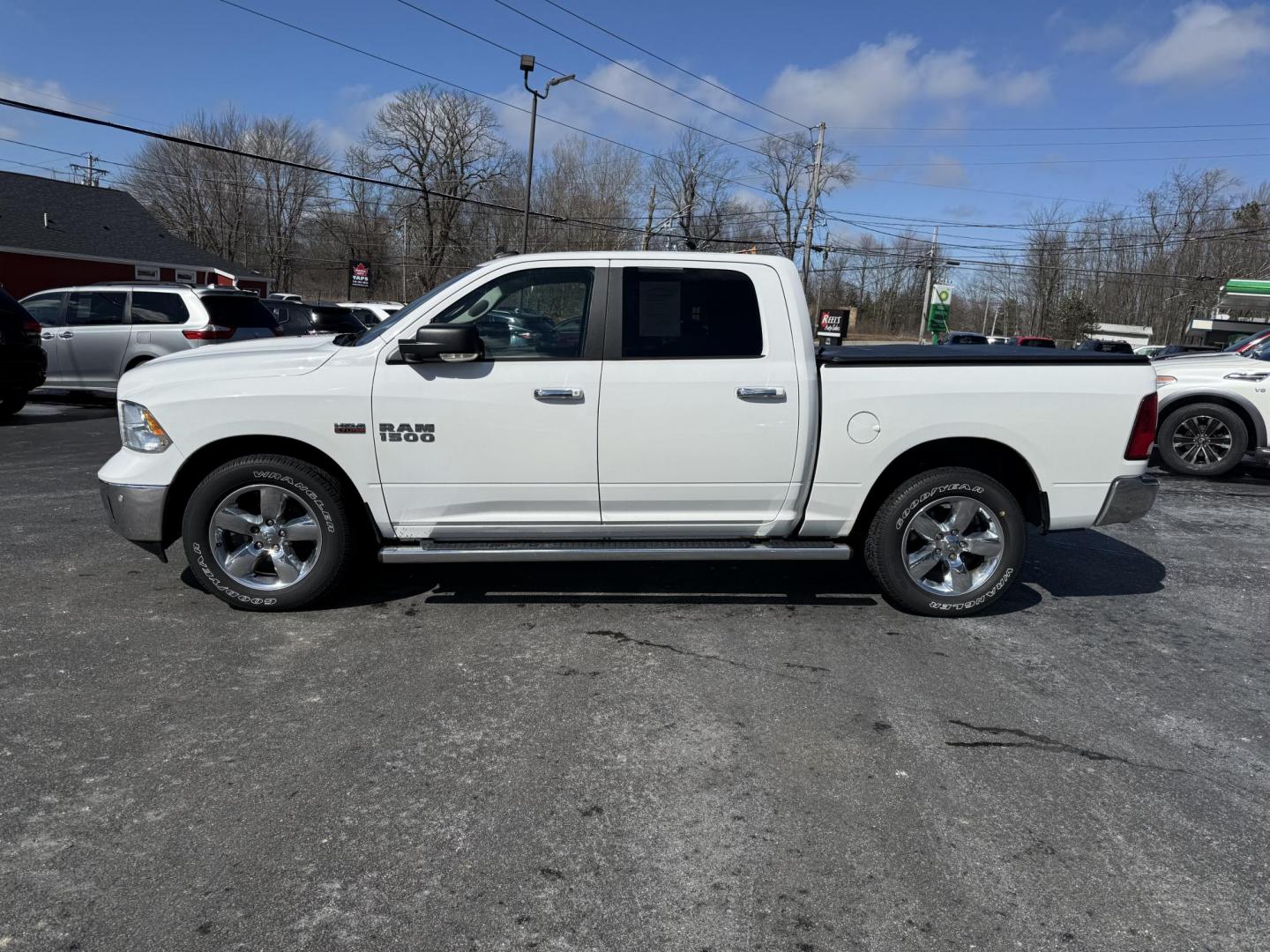 2016 White /Gray RAM 1500 Big Horn Crew Cab SWB 4WD (3C6RR7LT5GG) with an 5.7L V8 OHV 16V engine, 8-Speed Automatic transmission, located at 11115 Chardon Rd. , Chardon, OH, 44024, (440) 214-9705, 41.580246, -81.241943 - This 2016 Ram 1500 Big Horn Crew Cab is a capable and feature-rich pickup truck powered by a 5.7L HEMI V8 engine combined with an 8-speed automatic transmission, providing robust performance and smooth driving dynamics. It comes with 3.21 gearing, offering a balanced blend of power and efficiency, a - Photo#14