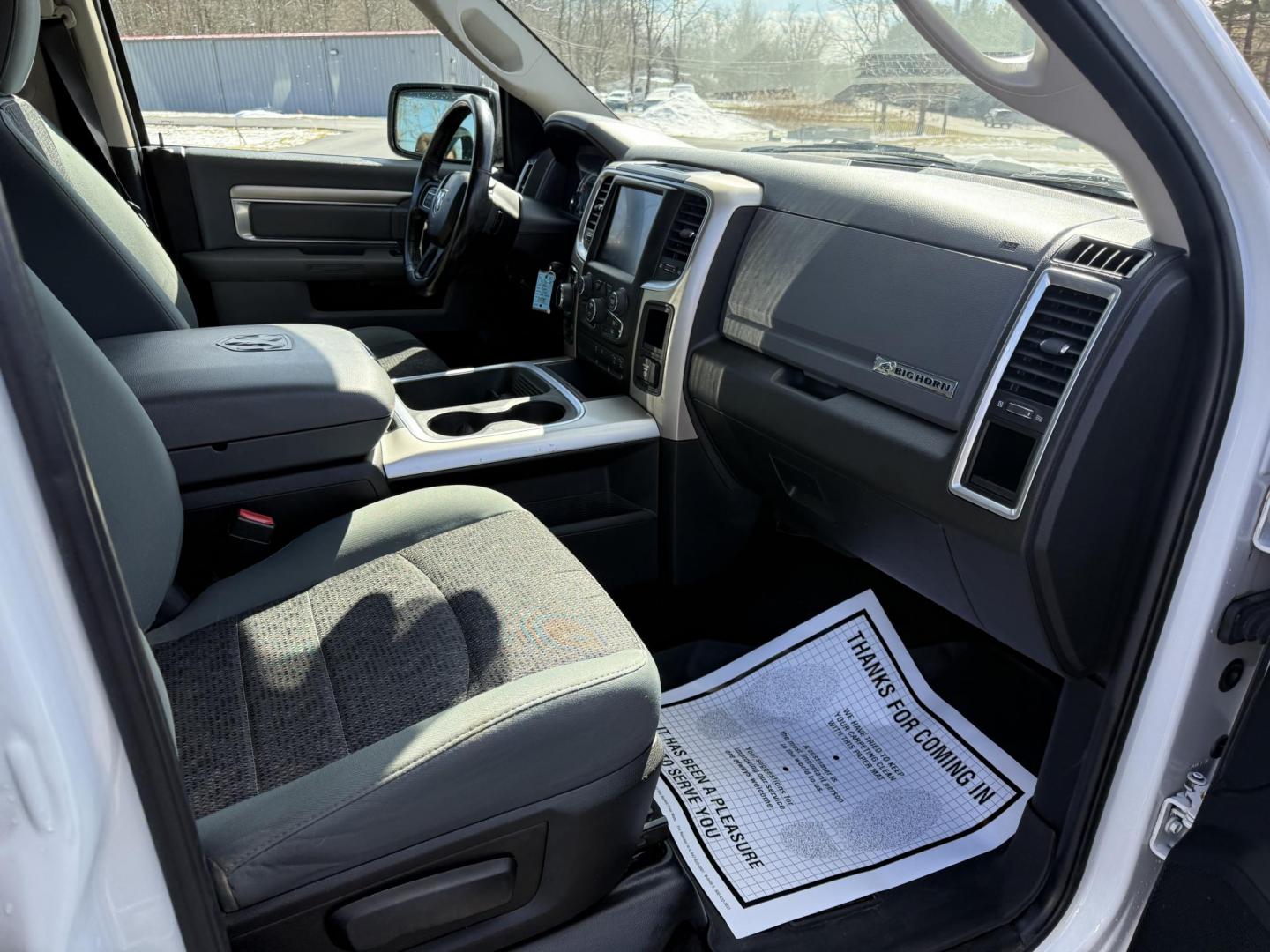 2016 White /Gray RAM 1500 Big Horn Crew Cab SWB 4WD (3C6RR7LT5GG) with an 5.7L V8 OHV 16V engine, 8-Speed Automatic transmission, located at 11115 Chardon Rd. , Chardon, OH, 44024, (440) 214-9705, 41.580246, -81.241943 - This 2016 Ram 1500 Big Horn Crew Cab is a capable and feature-rich pickup truck powered by a 5.7L HEMI V8 engine combined with an 8-speed automatic transmission, providing robust performance and smooth driving dynamics. It comes with 3.21 gearing, offering a balanced blend of power and efficiency, a - Photo#39