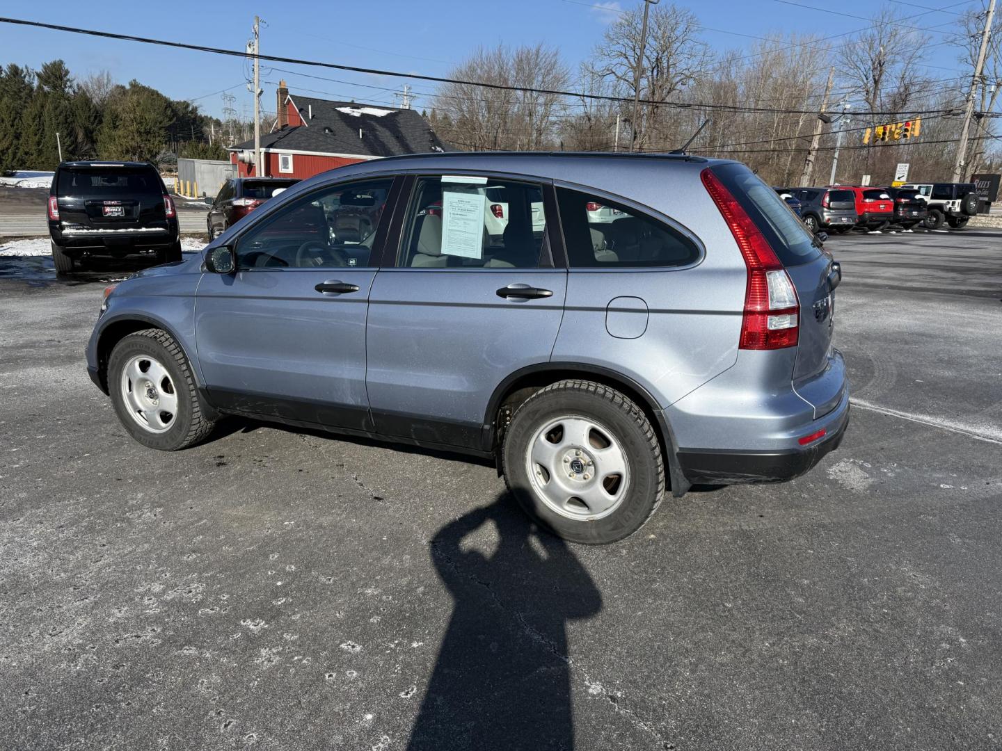 2010 Blue /Gray Honda CR-V LX 4WD 5-Speed AT (5J6RE4H31AL) with an 2.4L I4 DOHC 16V engine, 5-Speed Automatic transmission, located at 11115 Chardon Rd. , Chardon, OH, 44024, (440) 214-9705, 41.580246, -81.241943 - Photo#10