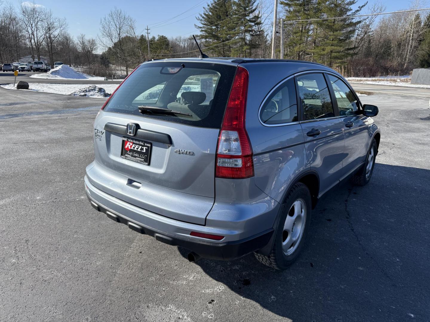 2010 Blue /Gray Honda CR-V LX 4WD 5-Speed AT (5J6RE4H31AL) with an 2.4L I4 DOHC 16V engine, 5-Speed Automatic transmission, located at 11115 Chardon Rd. , Chardon, OH, 44024, (440) 214-9705, 41.580246, -81.241943 - Photo#7