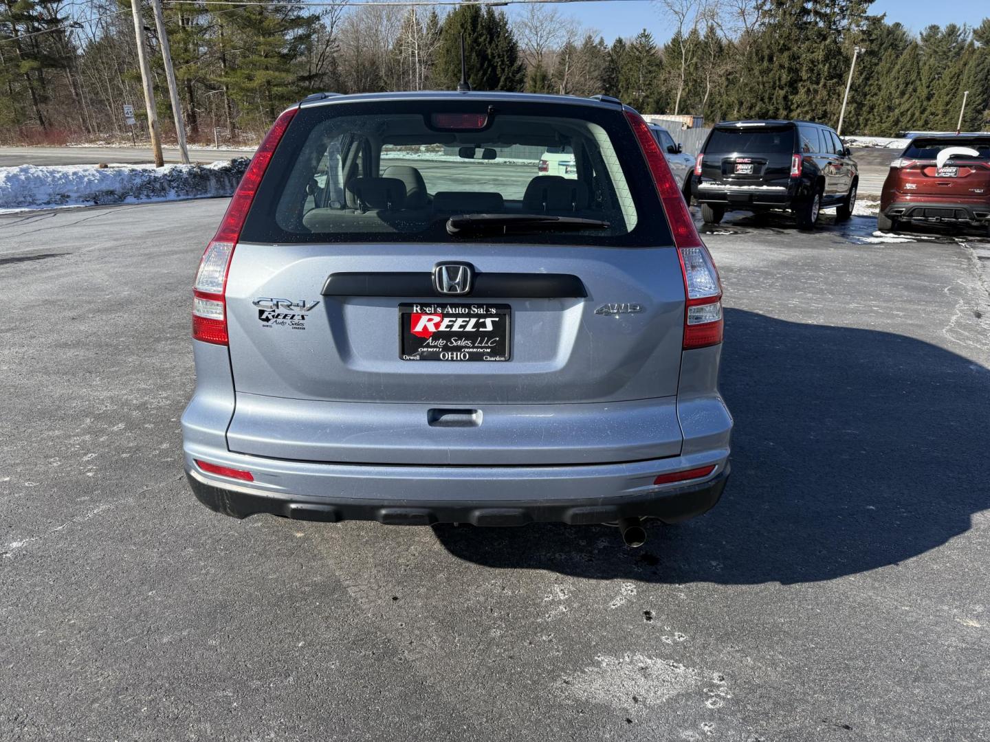 2010 Blue /Gray Honda CR-V LX 4WD 5-Speed AT (5J6RE4H31AL) with an 2.4L I4 DOHC 16V engine, 5-Speed Automatic transmission, located at 11115 Chardon Rd. , Chardon, OH, 44024, (440) 214-9705, 41.580246, -81.241943 - Photo#9